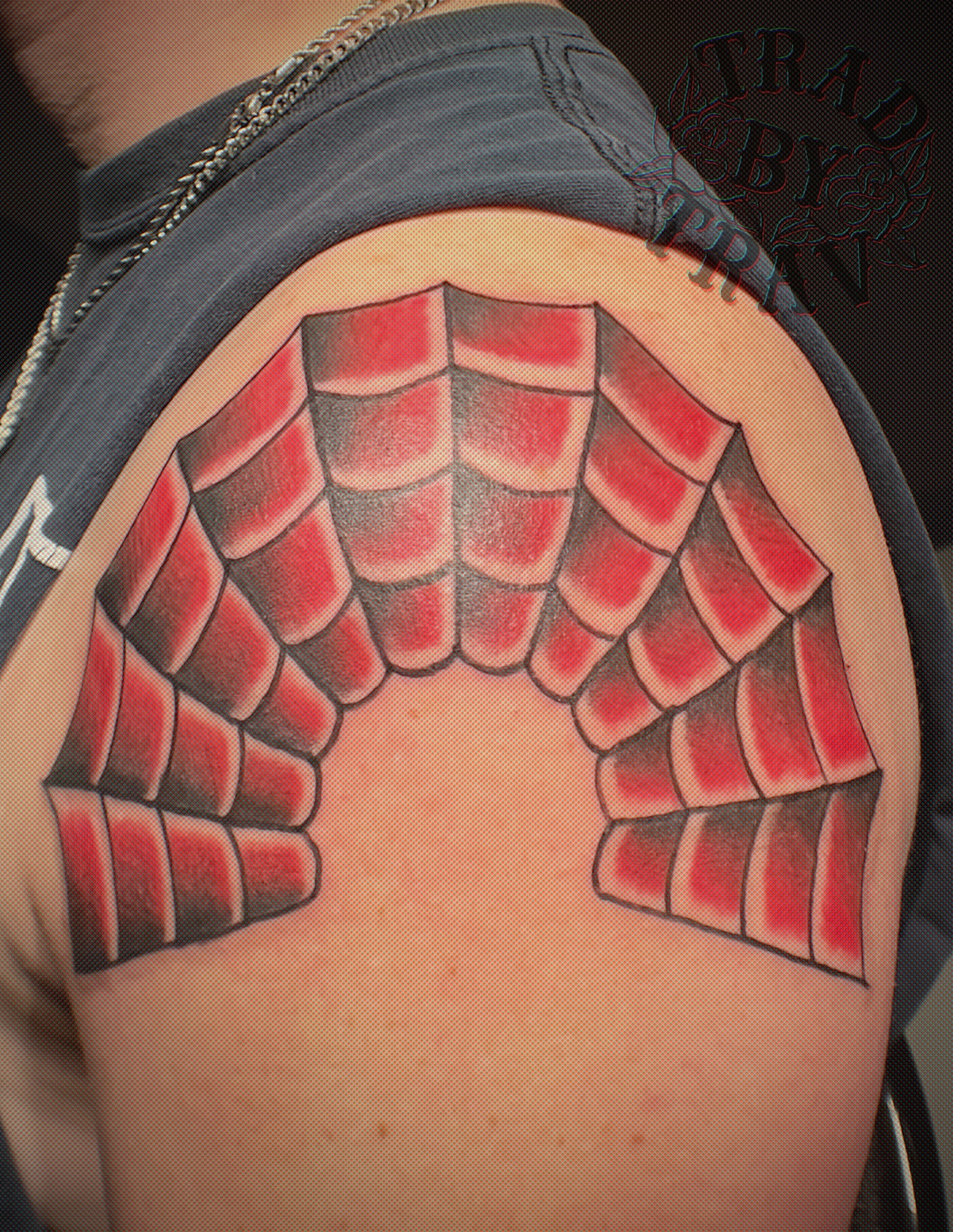 Scale pattern American traditional tattoo on the shoulder by Travis B