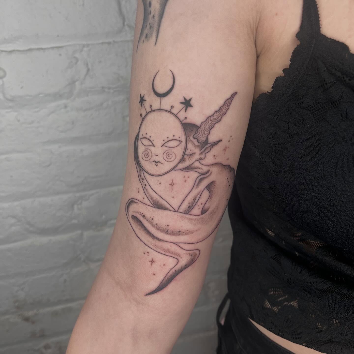 Moon and crescent dotwork tattoo on the forearm by 𝔇𝔢𝔰𝔦
