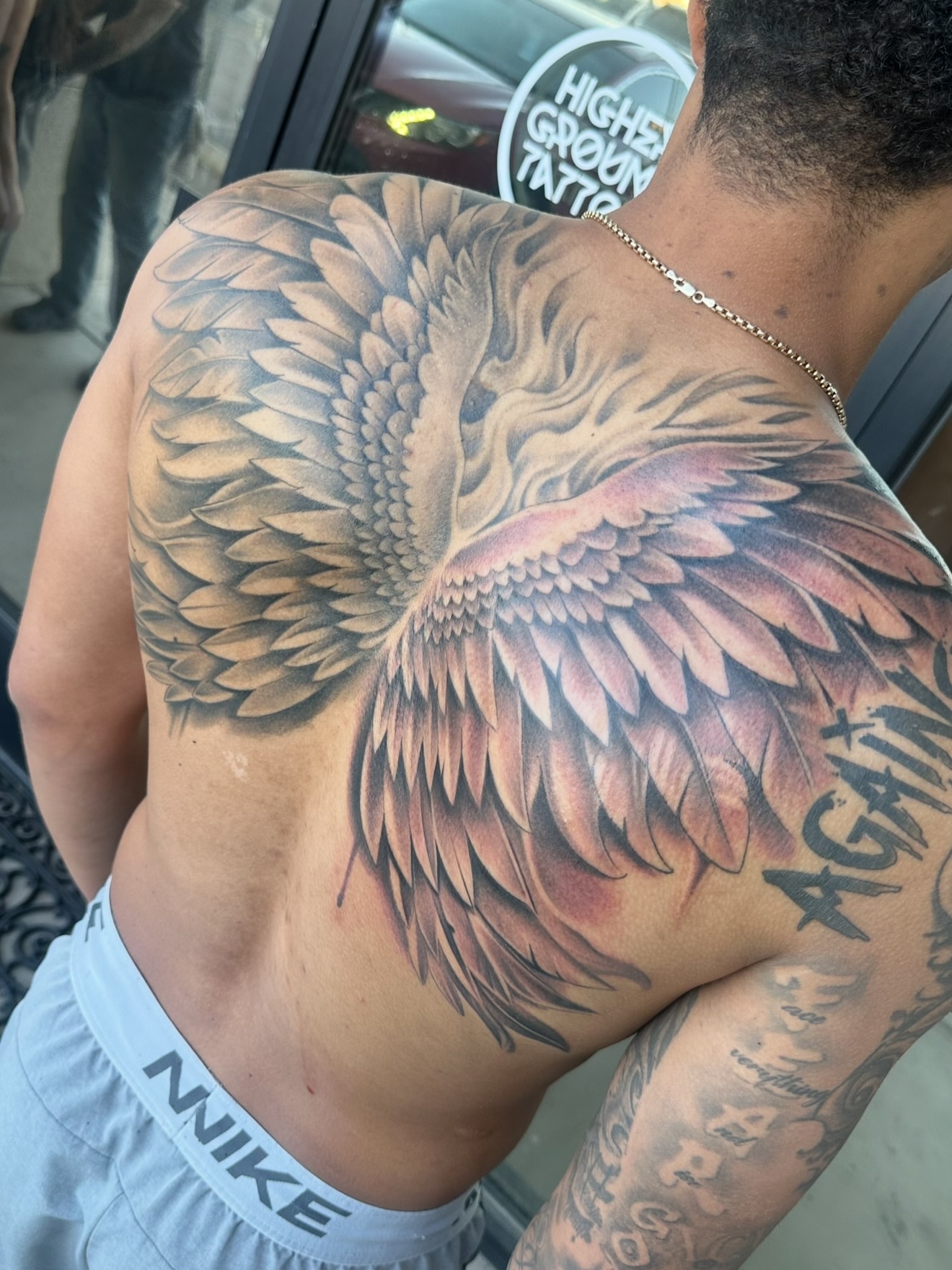 Wings realism tattoo on the back by Jevon Glasco Tattoos