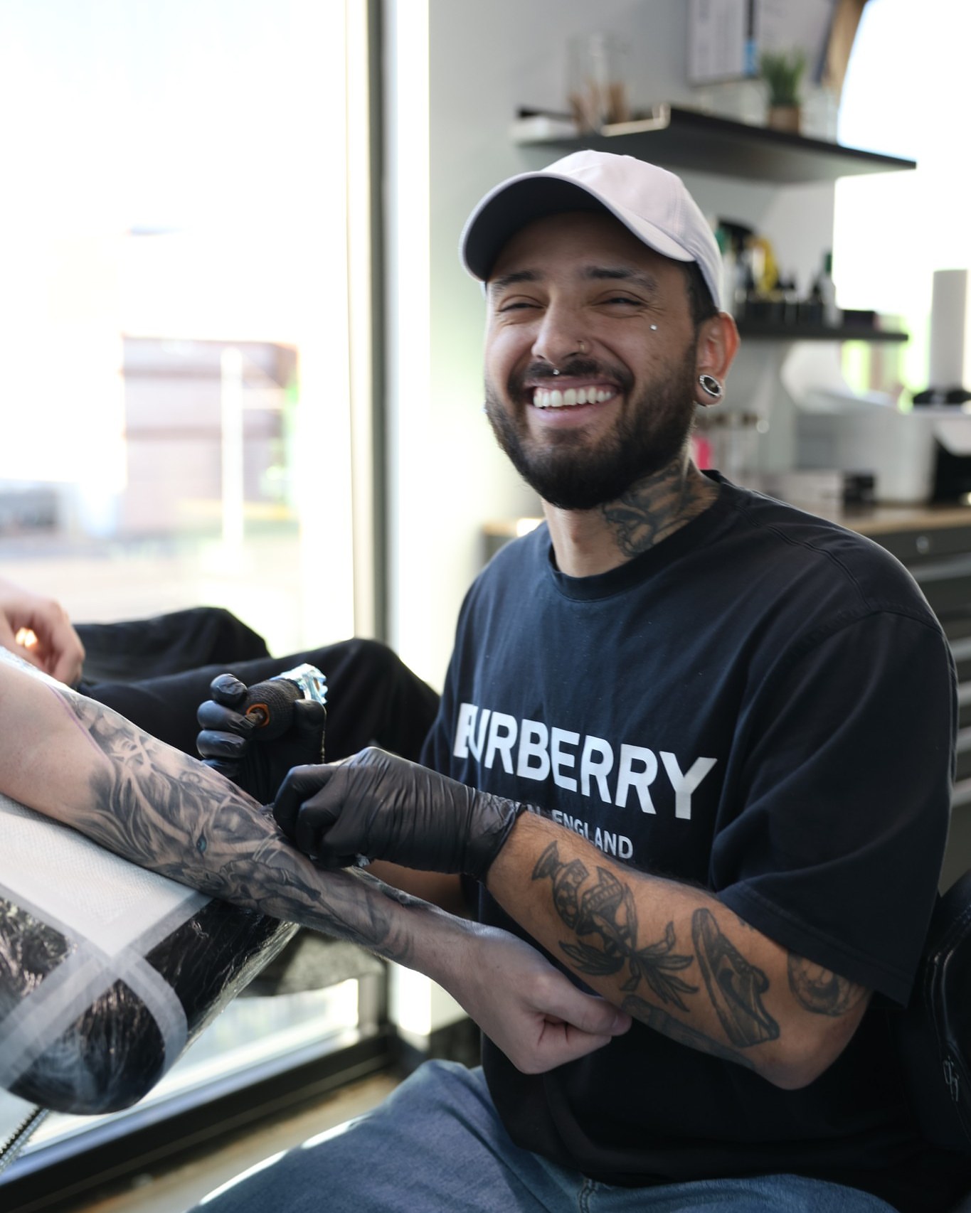 Floral design black and grey tattoo on the forearm by Diego Andrés Cárdenas