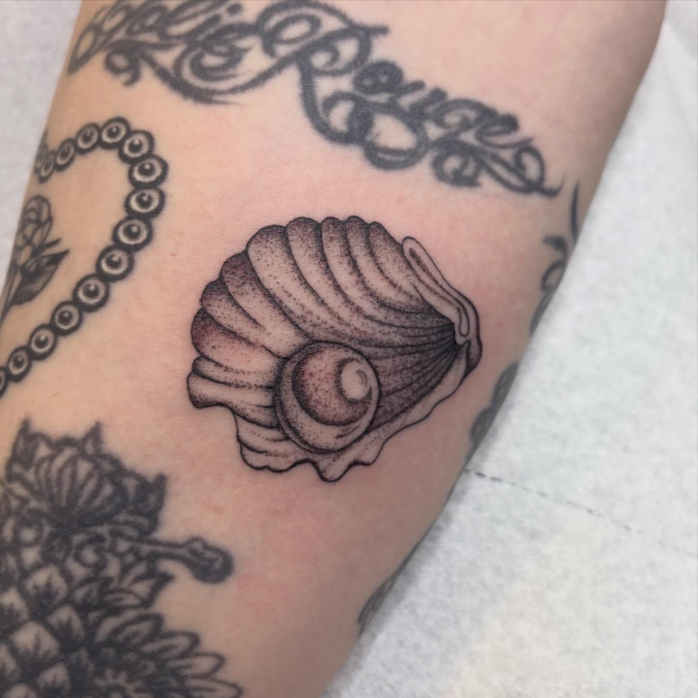 Tattoo by @alliemoontattoo — dotwork