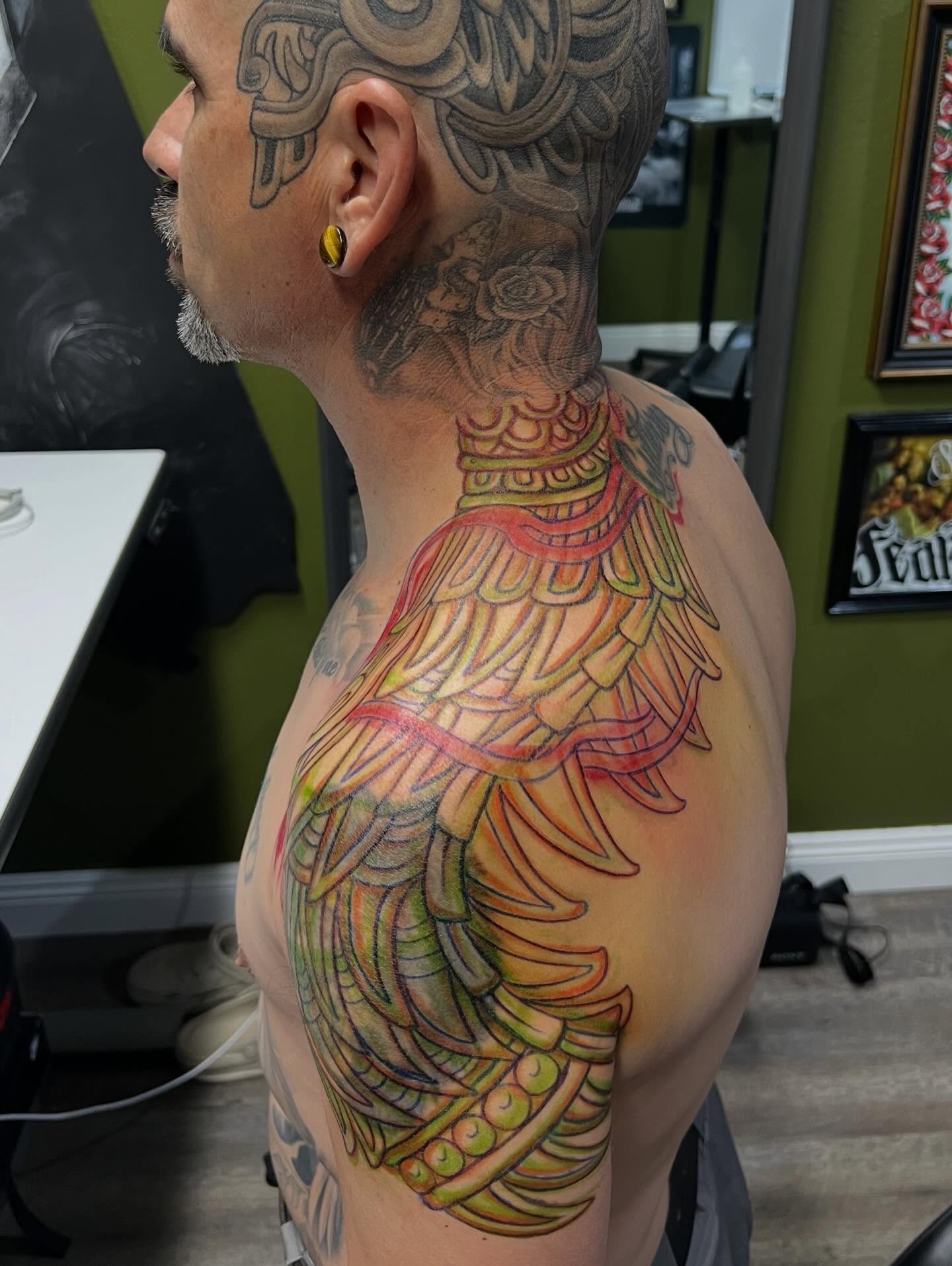 Winged dragon American traditional tattoo on the shoulder by Niz Carrillo