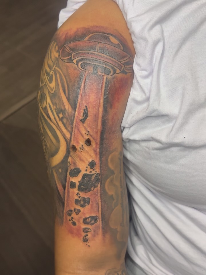 Spacecraft and footprints dotwork tattoo on the forearm by Tattoosbydevon