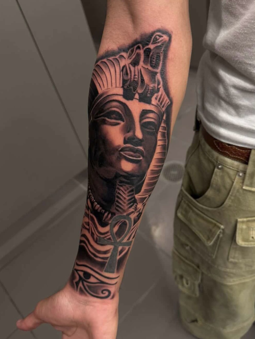 Pharaoh realism tattoo on the forearm by Mando