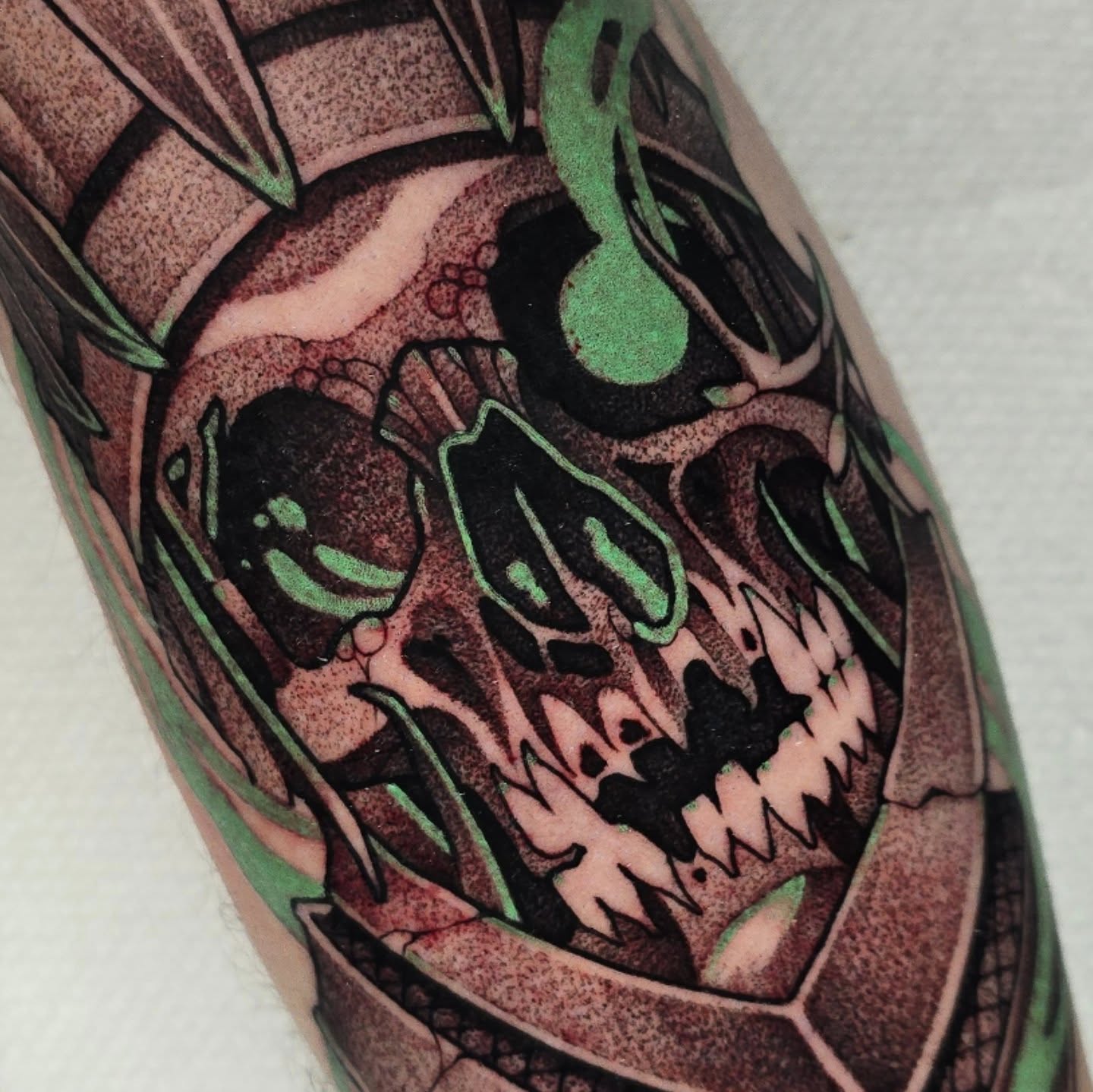 Skull black and grey tattoo on the forearm by Justin Eldridge