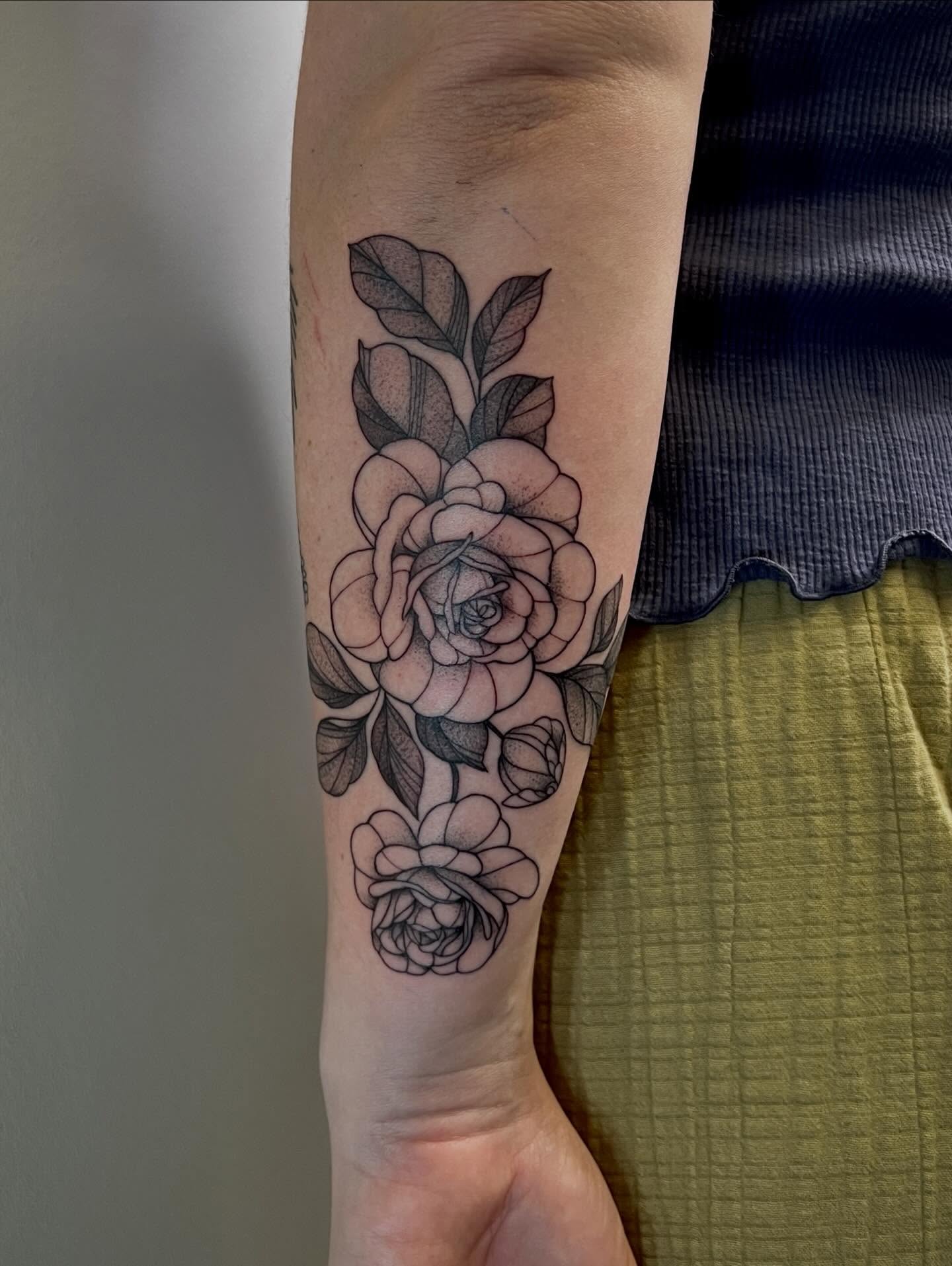 Roses black and grey tattoo on the forearm by Presley Tattoos, Murfreesboro, Tennessee
