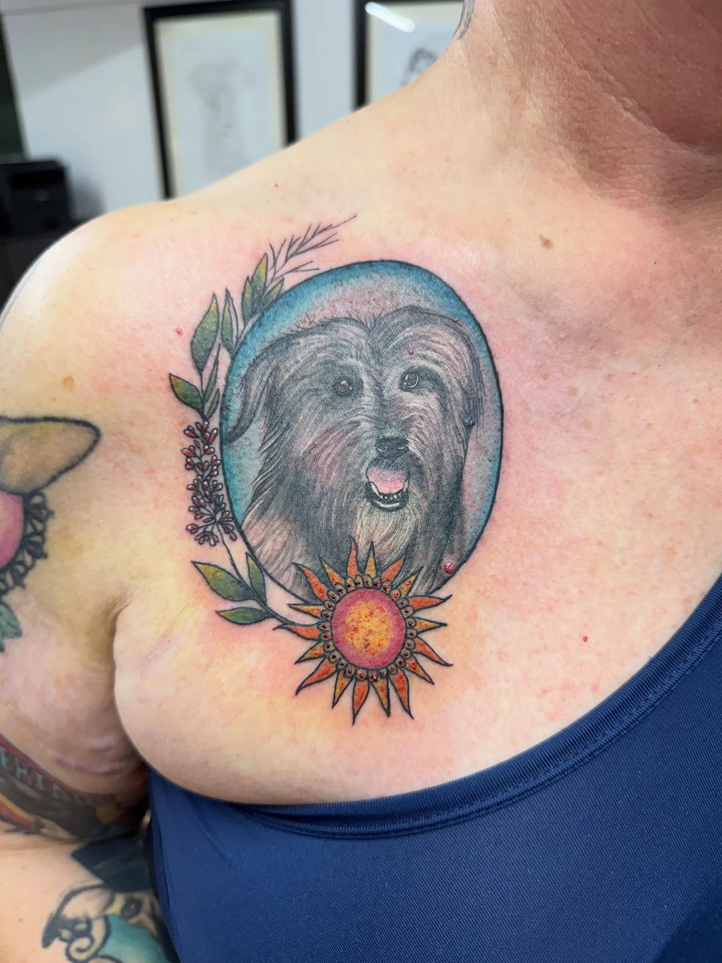 Dog portrait realism tattoo on the chest by Victorian Coleman