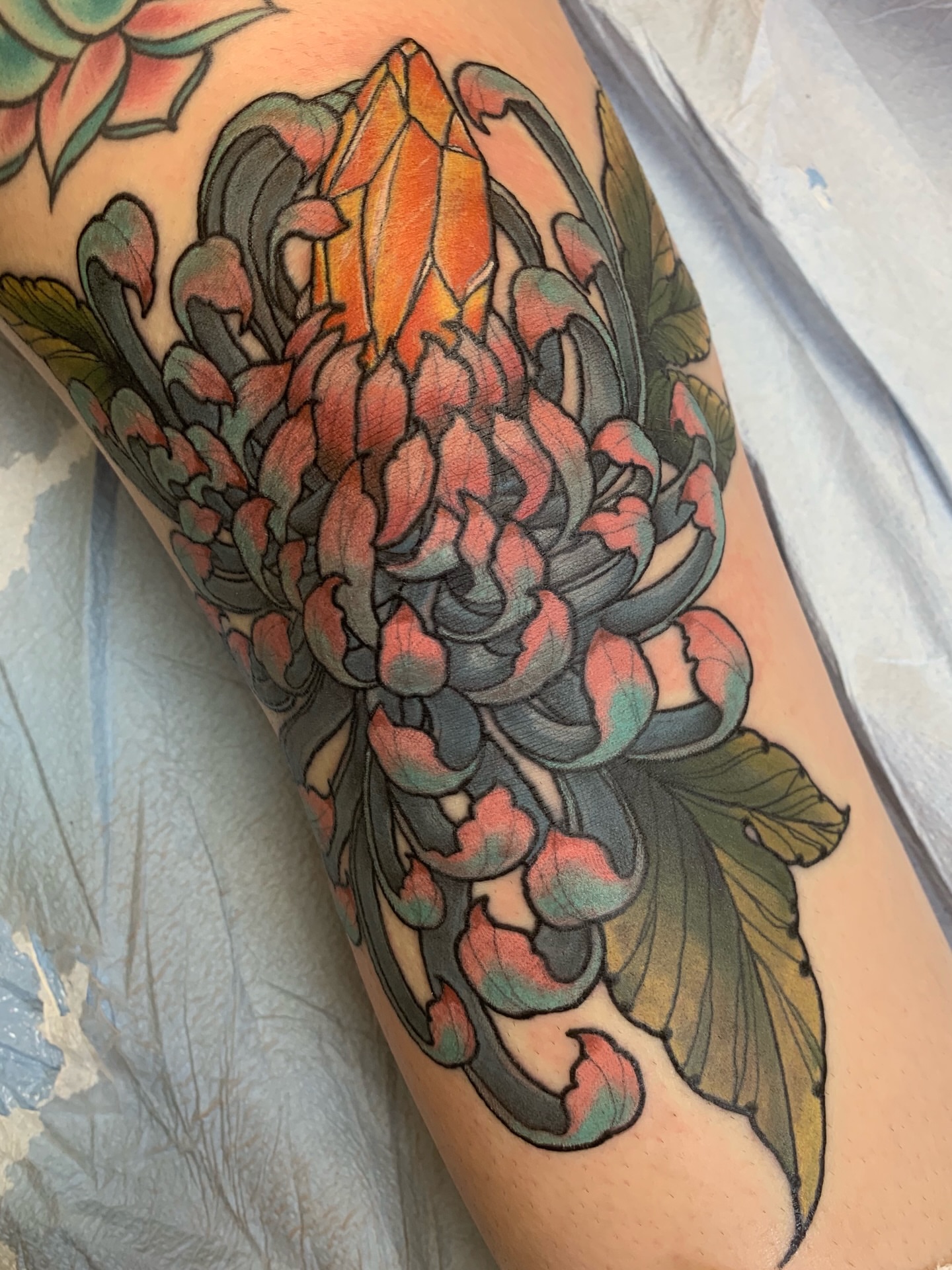 Chrysanthemum japanese irezumi tattoo on the forearm by Brian DiCola Tattooer