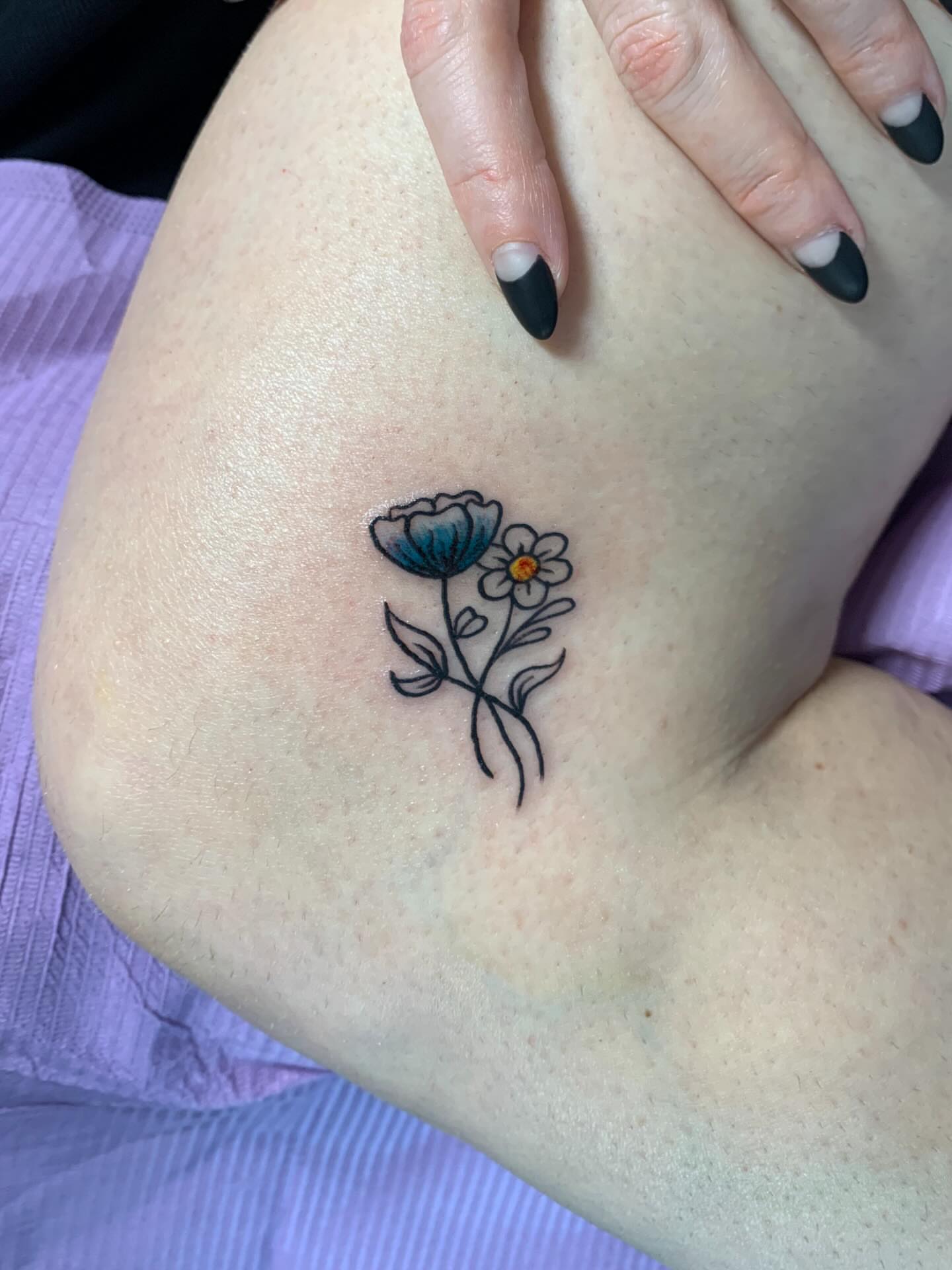 Flowers black and grey tattoo on the thigh by CharlieBoy