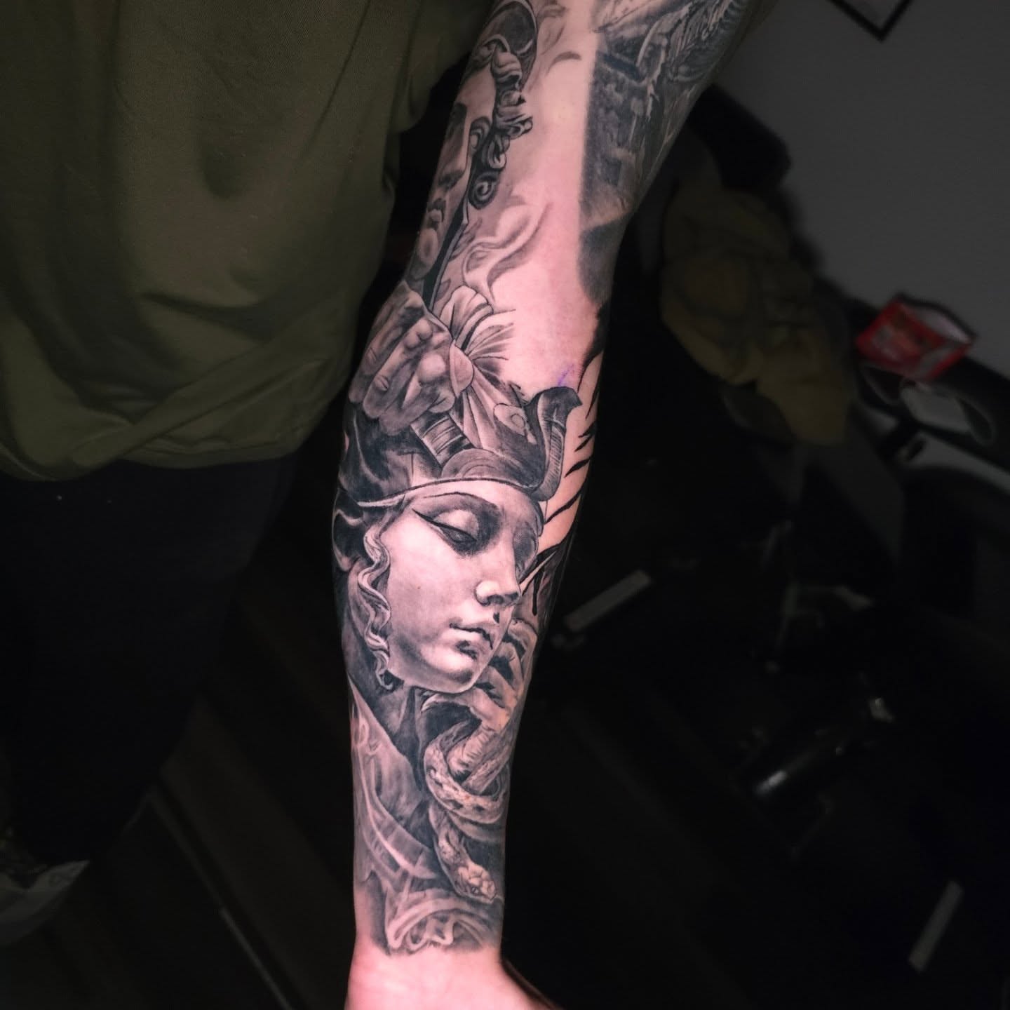 Woman's head realism tattoo on the forearm by Efren Del Rio