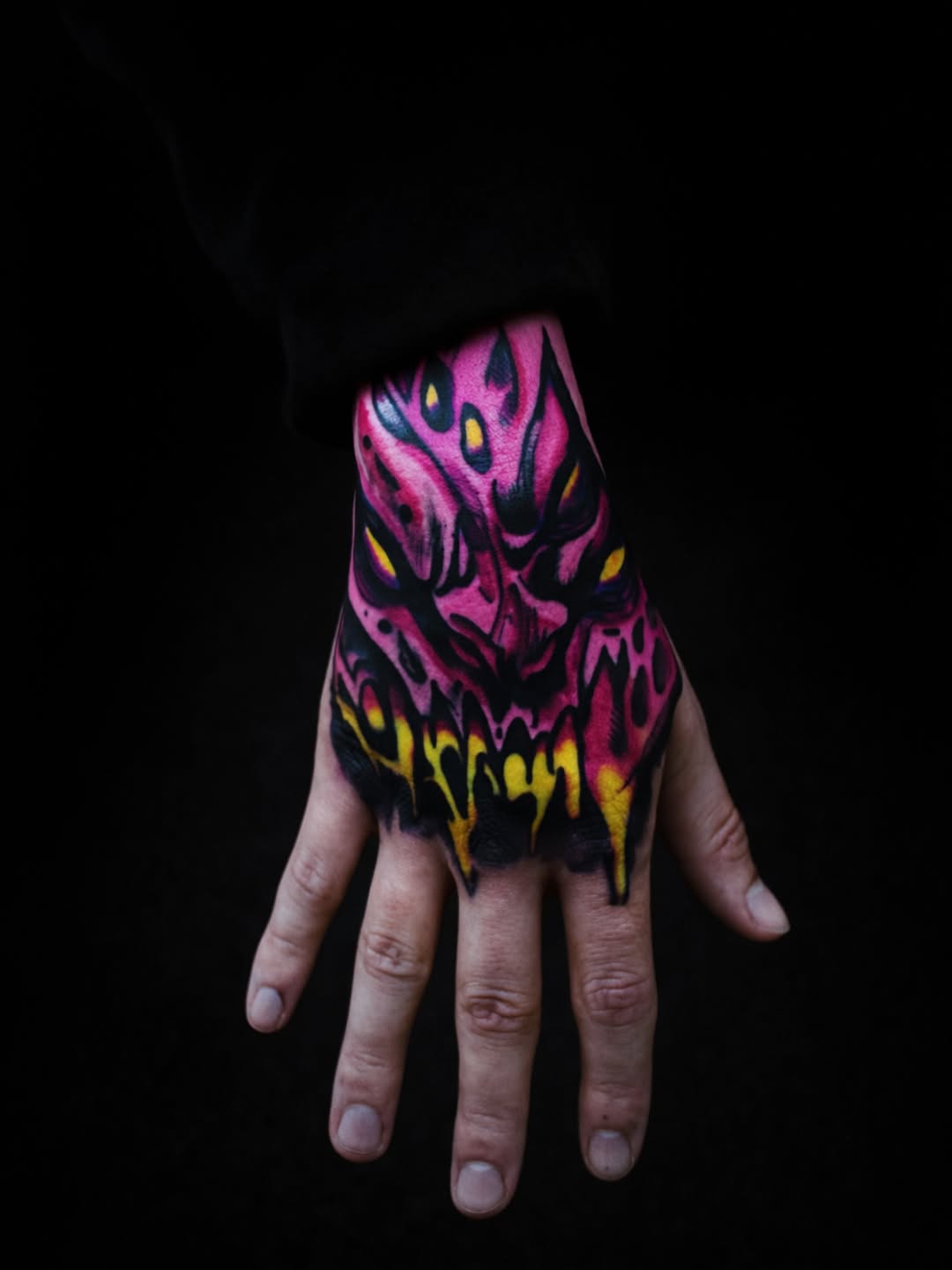 Abstract monster face realism tattoo on the hand by K Valentine