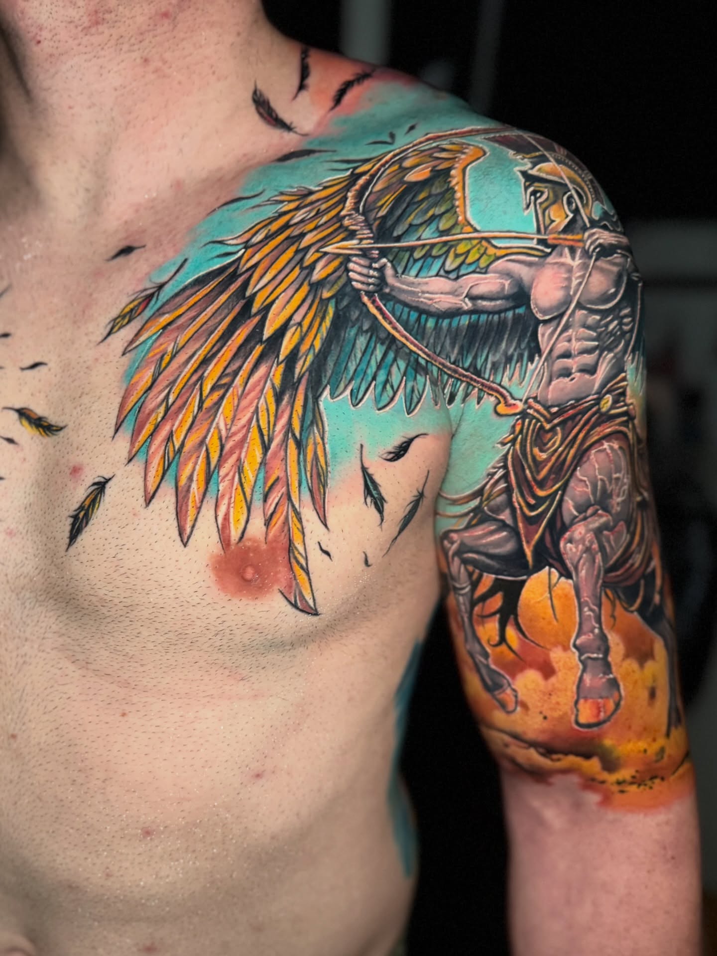 Archer with wings new school tattoo on the shoulder by Yanko Reyes