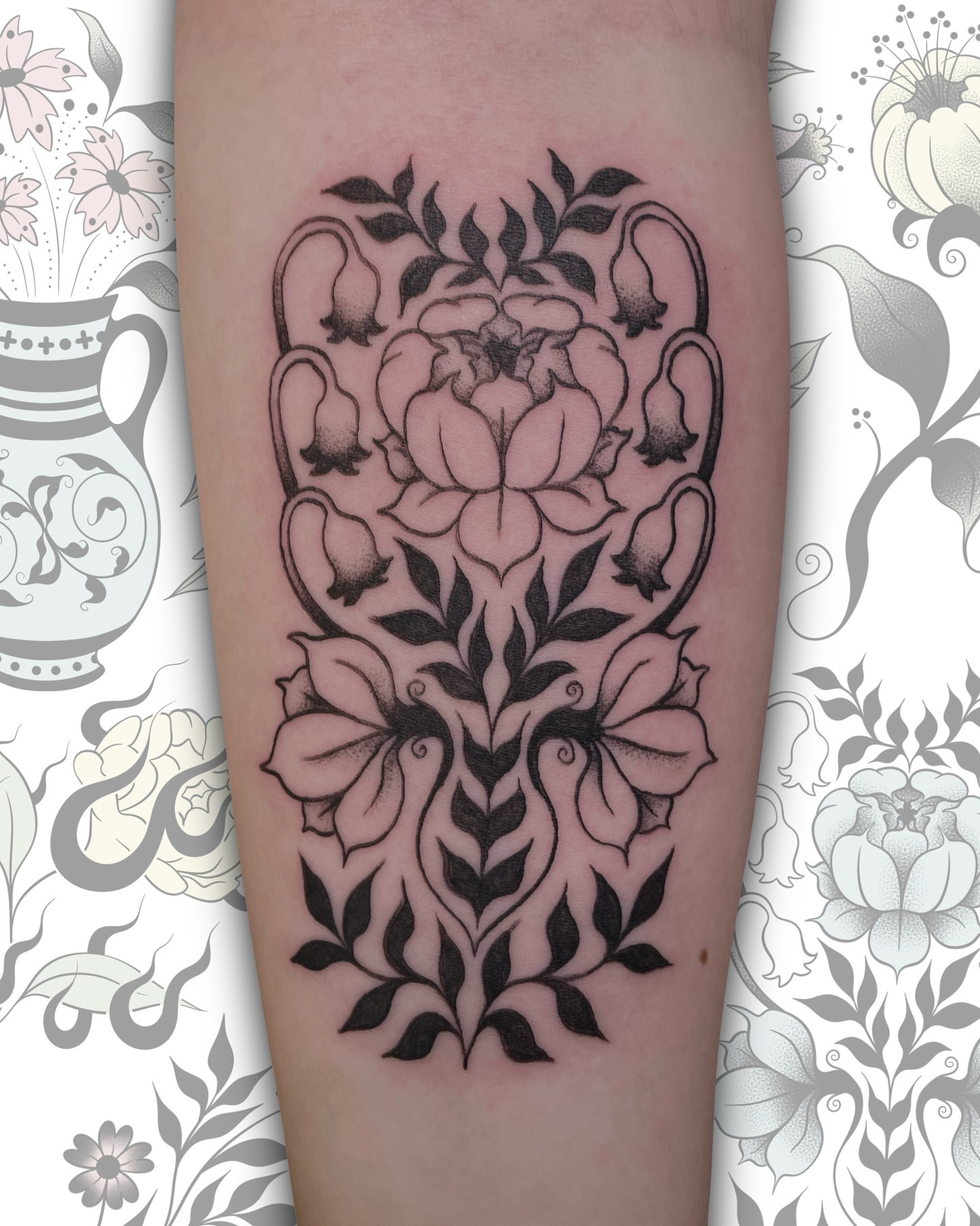 Floral arrangement black and grey tattoo on the forearm by Sydney “Goose “ Lange