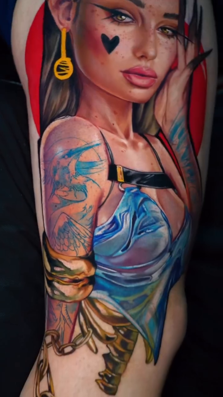 Neo-traditional tattoo on the upper arm by Daria Pirojenko