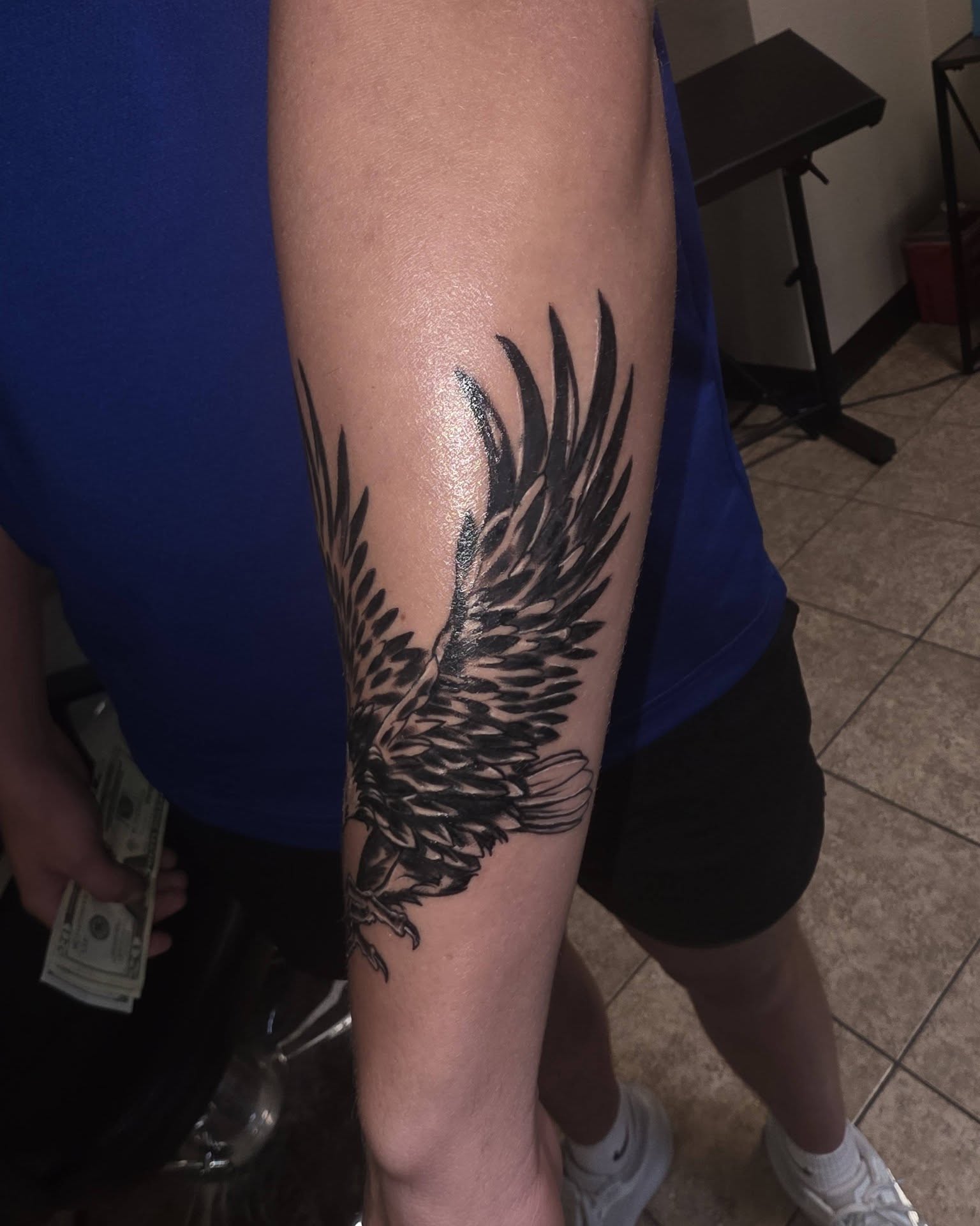 Wing black and grey tattoo on the forearm by Jessica DarkRabbit