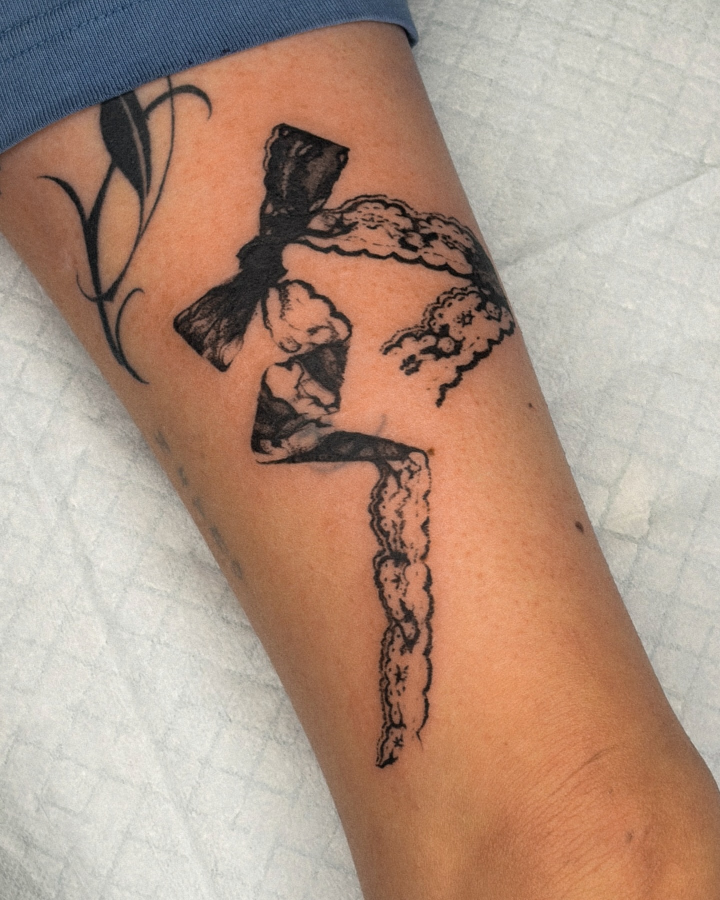Hat and clouds black and grey tattoo on the forearm by ☆ gia