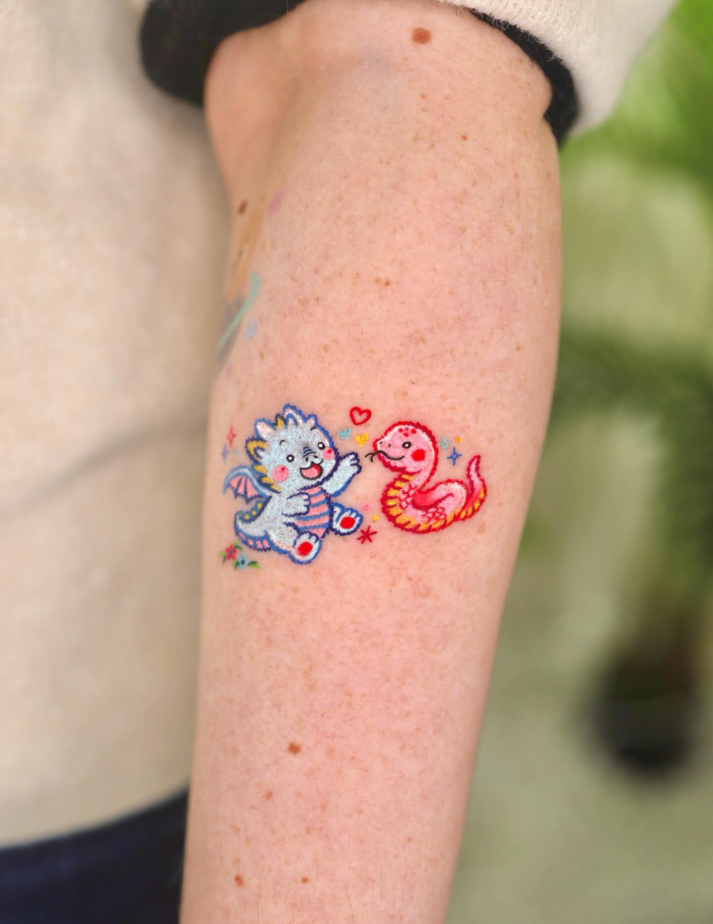 Cat and snake dotwork tattoo on the forearm by Kettle🤍케틀