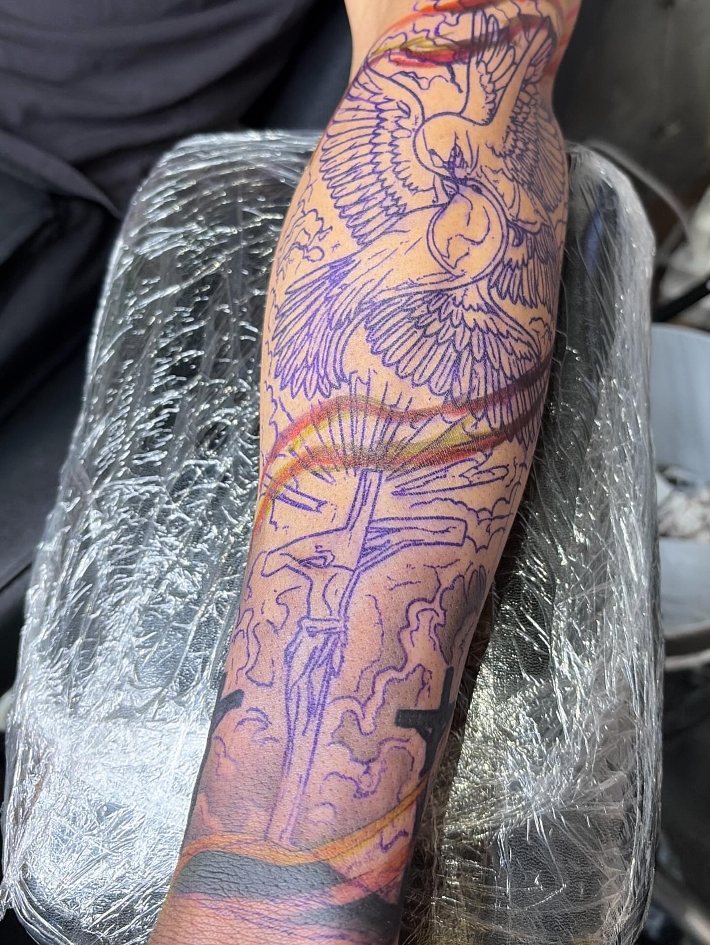 Eagle and cross American traditional tattoo on the forearm by Jaylen - Atlanta Tattoo Artist