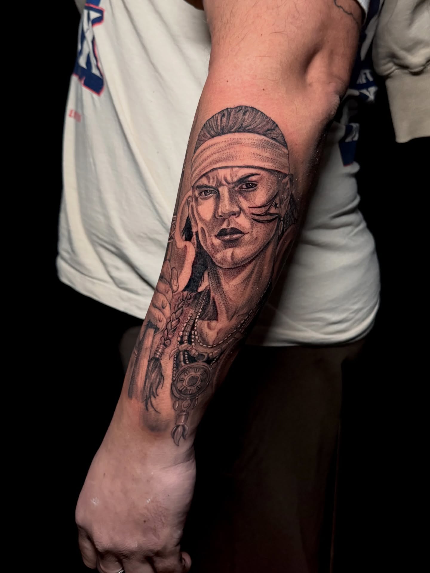 Portrait realism tattoo on the forearm by Tattoo Artist