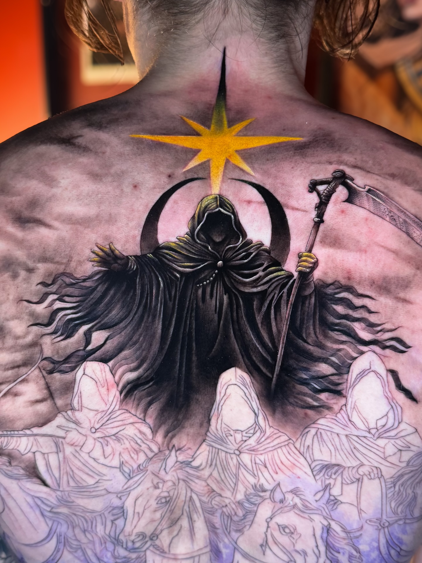 Apocalyptic scene dark realism tattoo on the back by Franz Muñoz