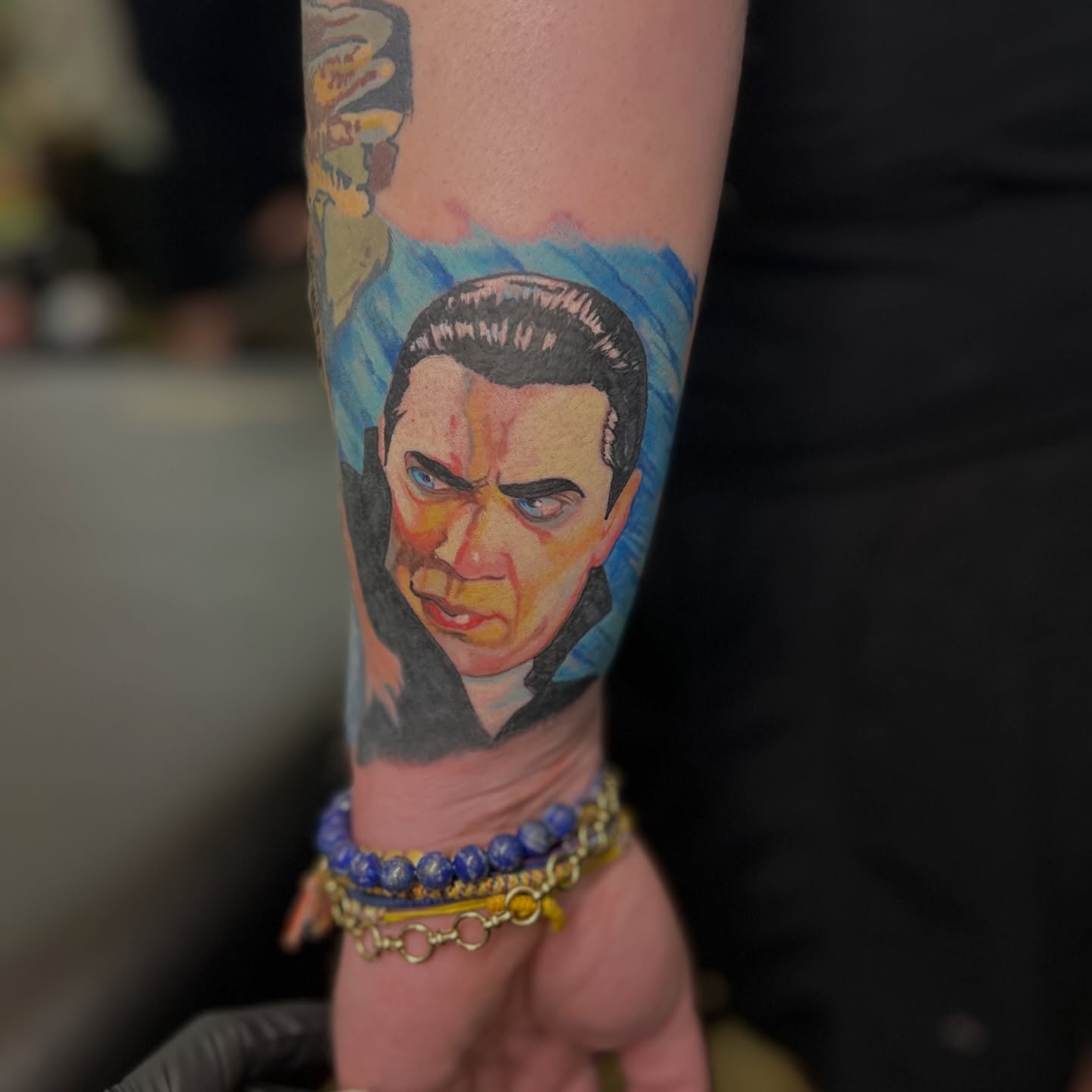 Portrait realism tattoo on the forearm by Alex Santaloci