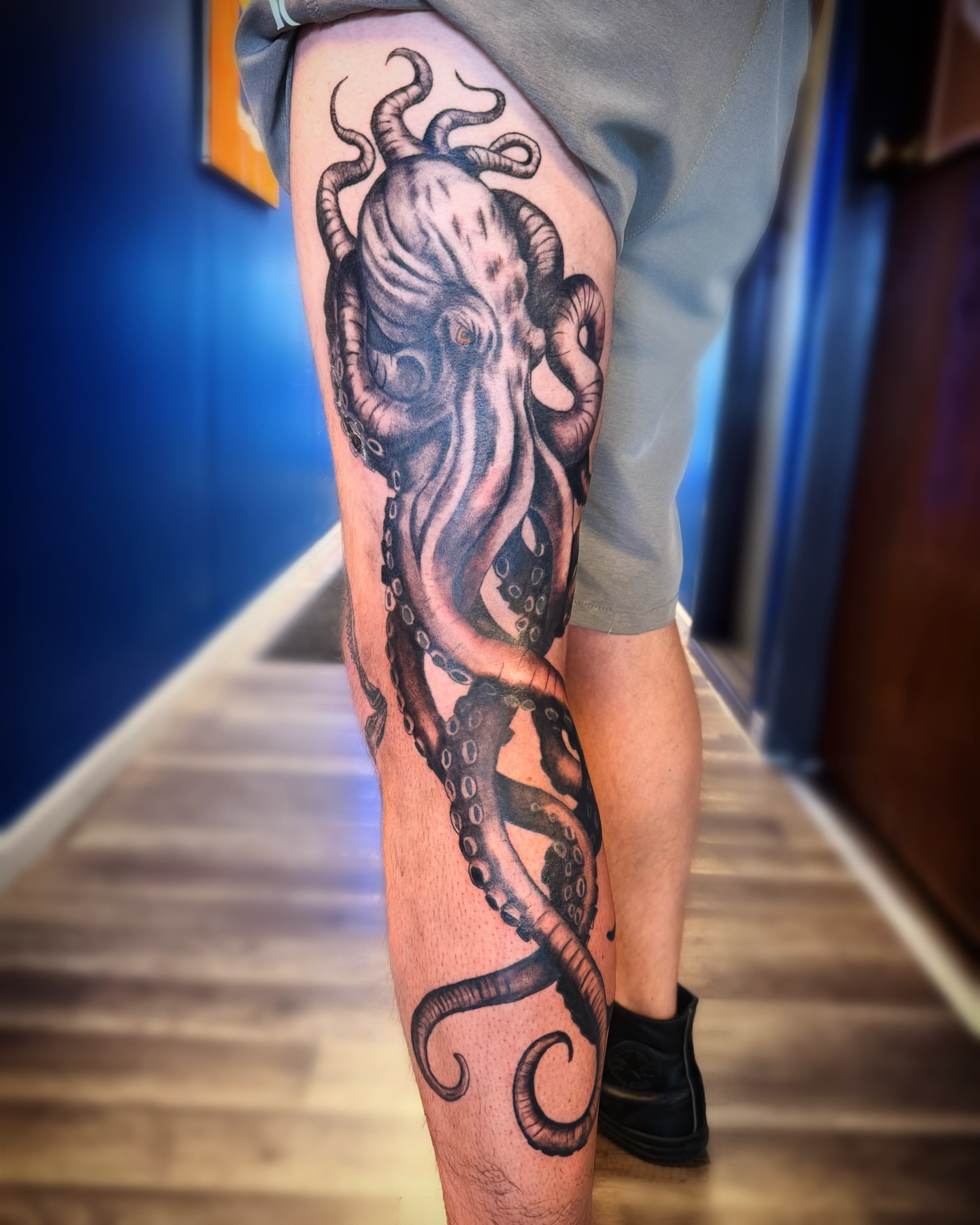 Octopus realism tattoo on the leg by Kate