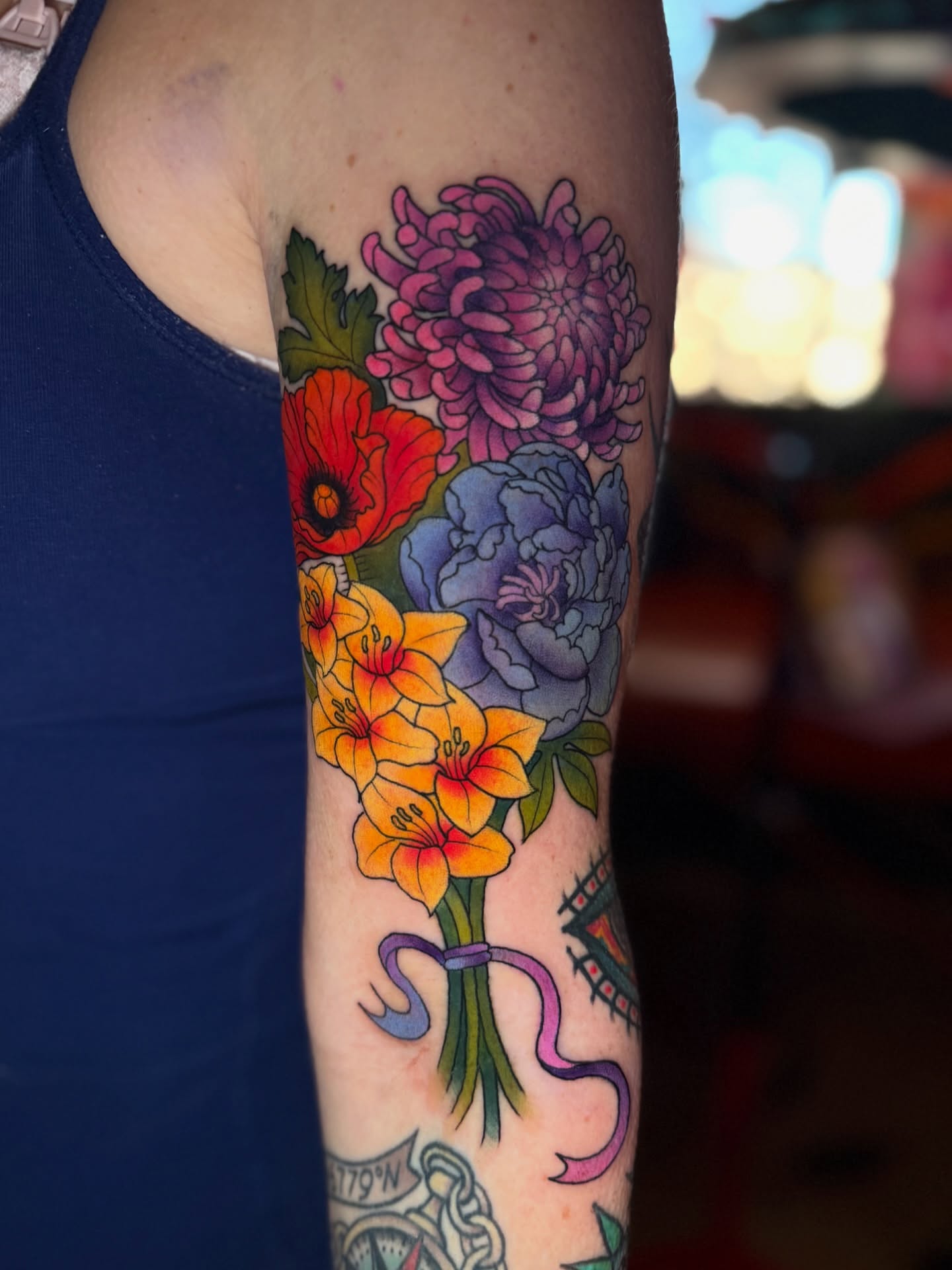 Flower bouquet new school tattoo on the forearm by 🍄Annie Burkhard🍄, Indianapolis, Indiana