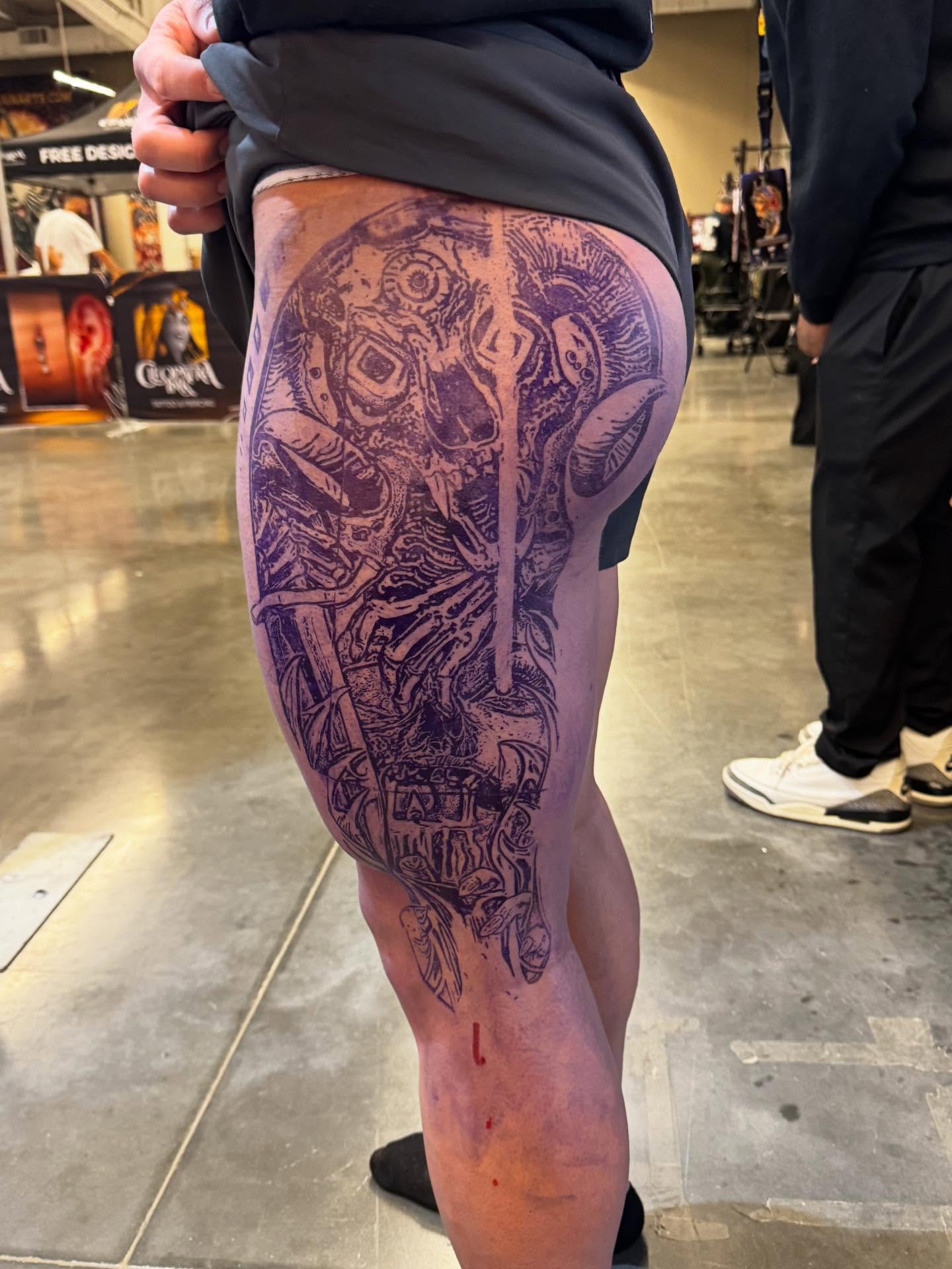 Cyborg geometric tattoo on the thigh by Shawn Skale