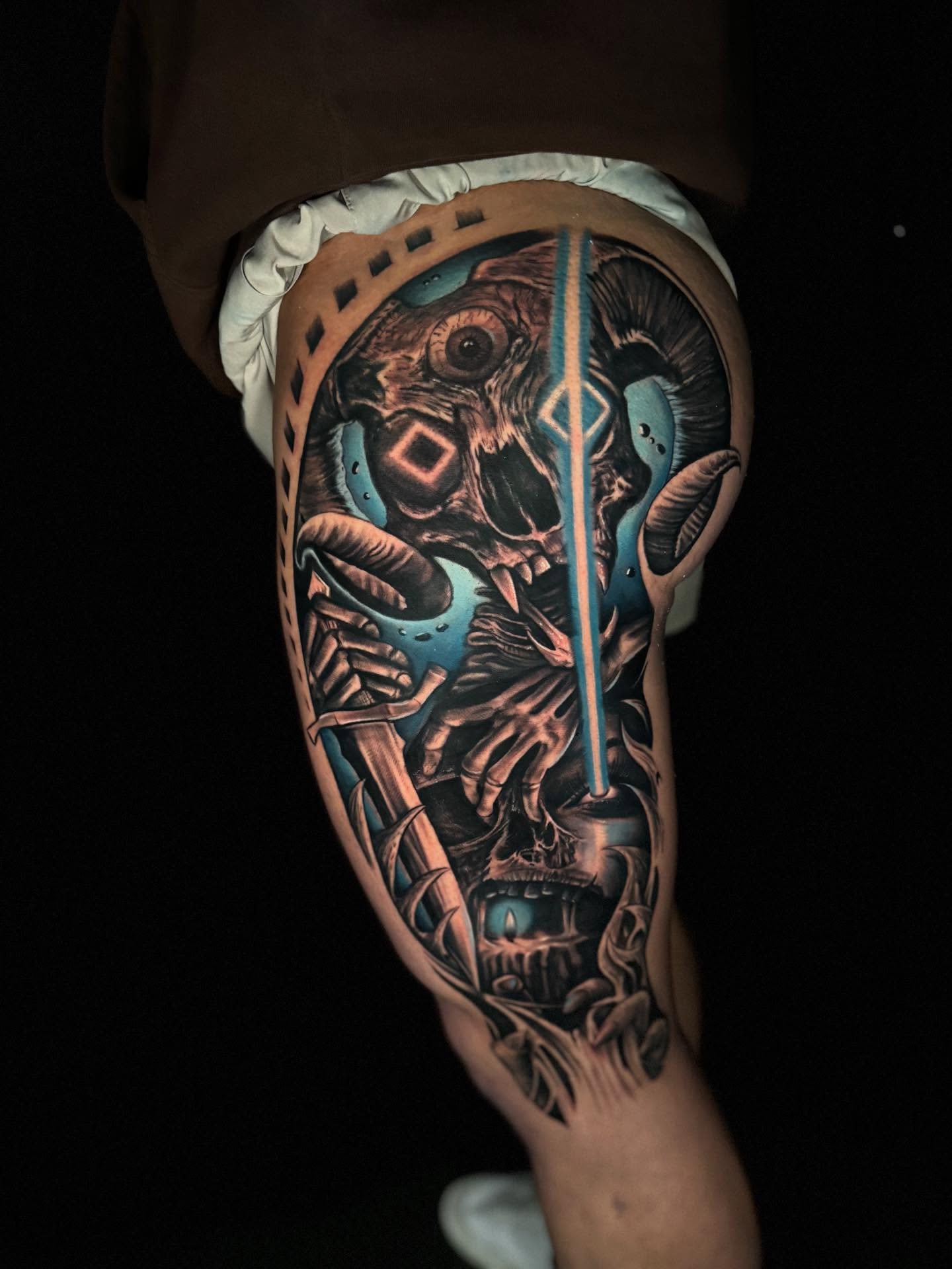Owl and mechanical elements dark realism tattoo on the thigh by Shawn Skale