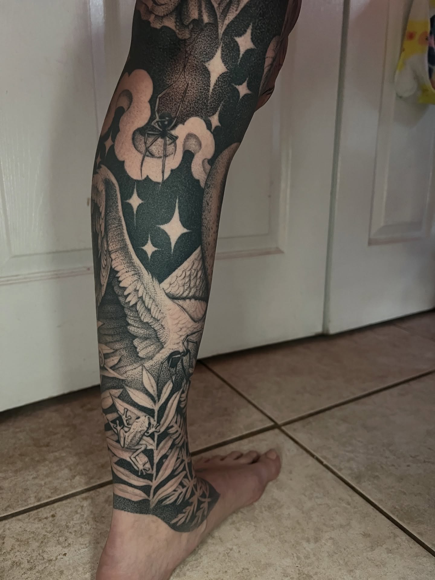 Bird and floral dotwork tattoo on the forearm by Natasha