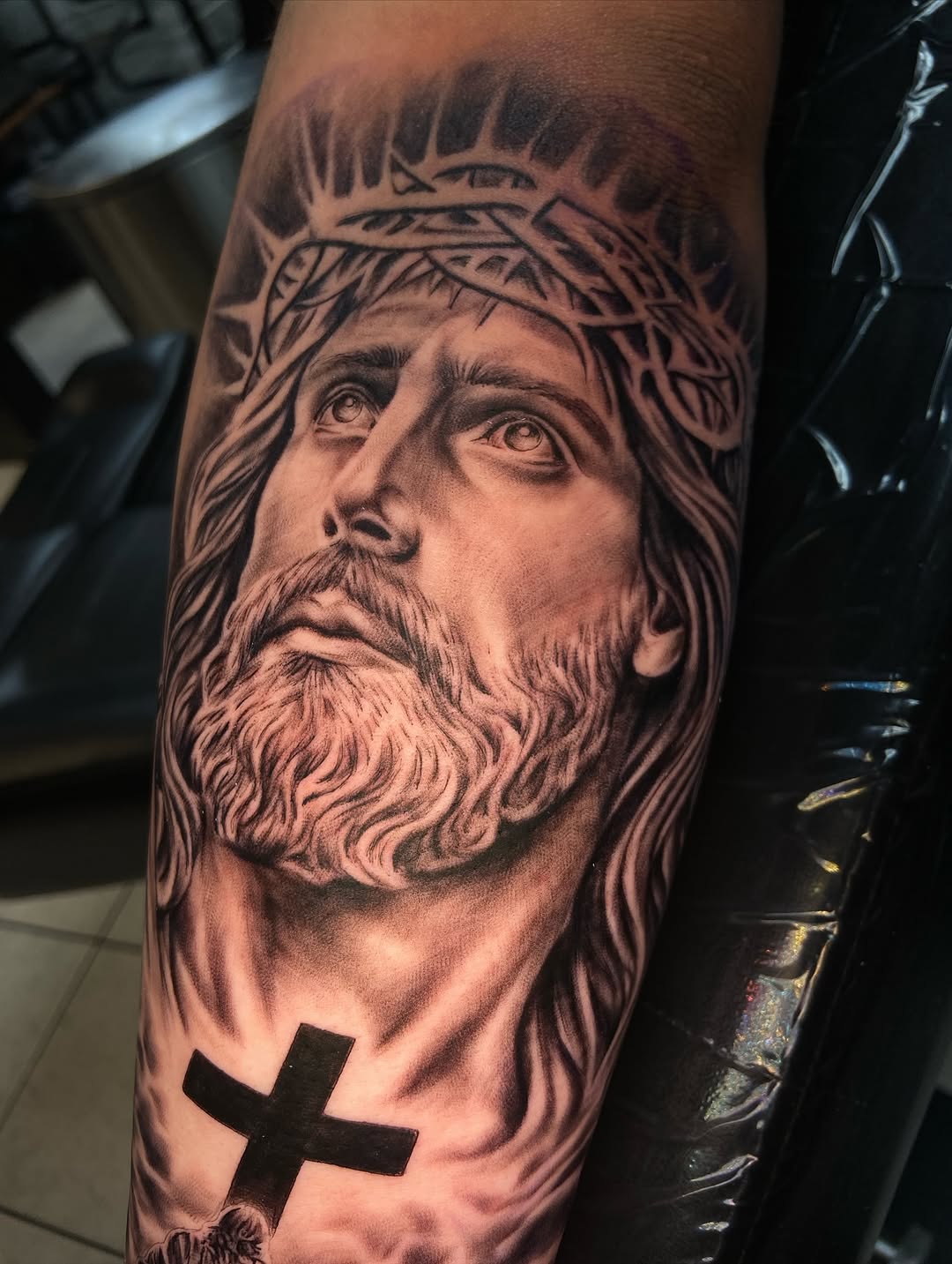 Realism tattoo on the forearm by Chicago Tattoo Artist