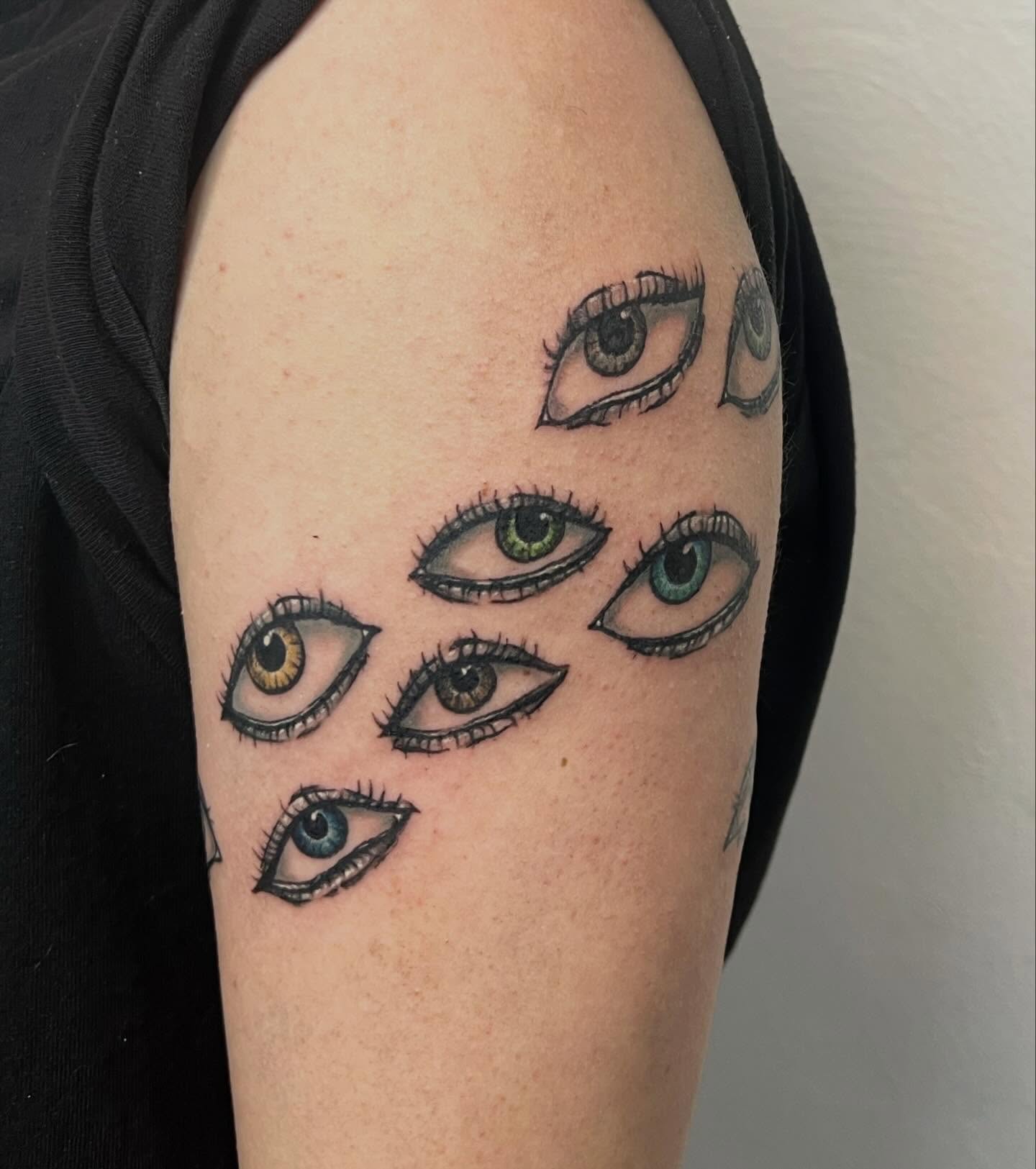 Eyes realism tattoo on the forearm by Amber Rose