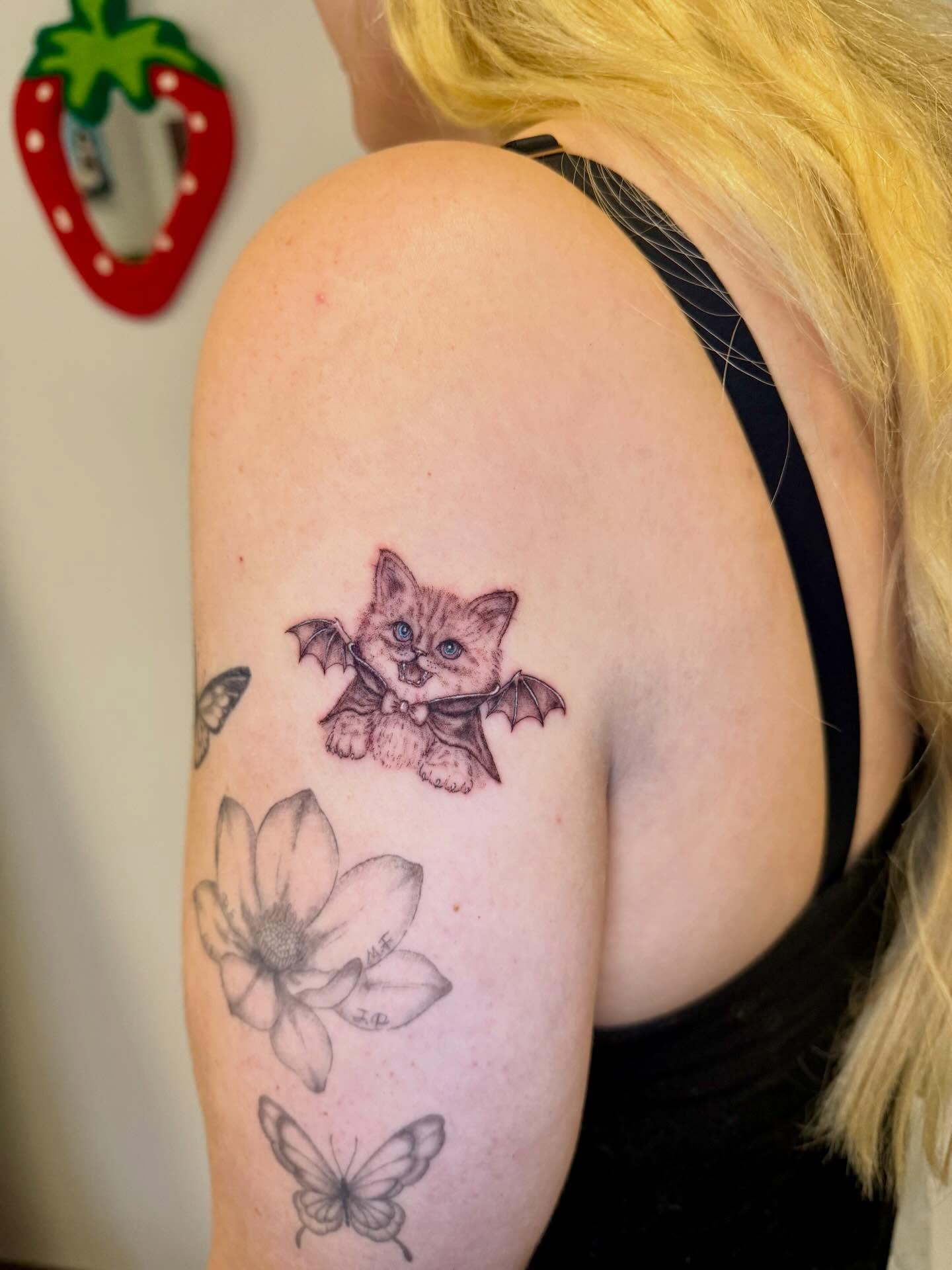 Tattoo by @catgirltattoo — realism, dotwork