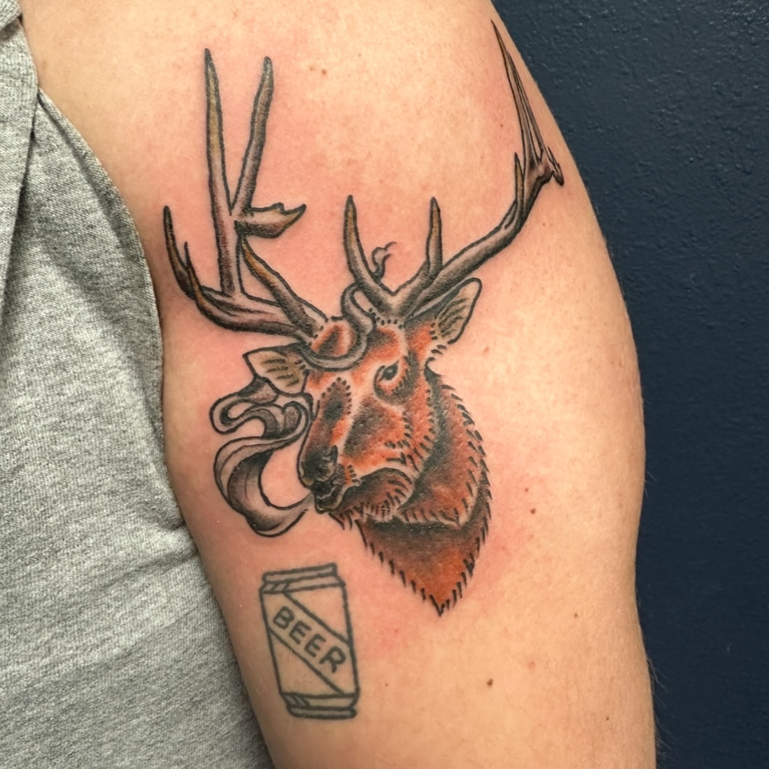 Deer head with beer can realism tattoo on the forearm by Maggie De La Torre ๐ณ๏ธโโง๏ธ๐ฒ๐ฝ