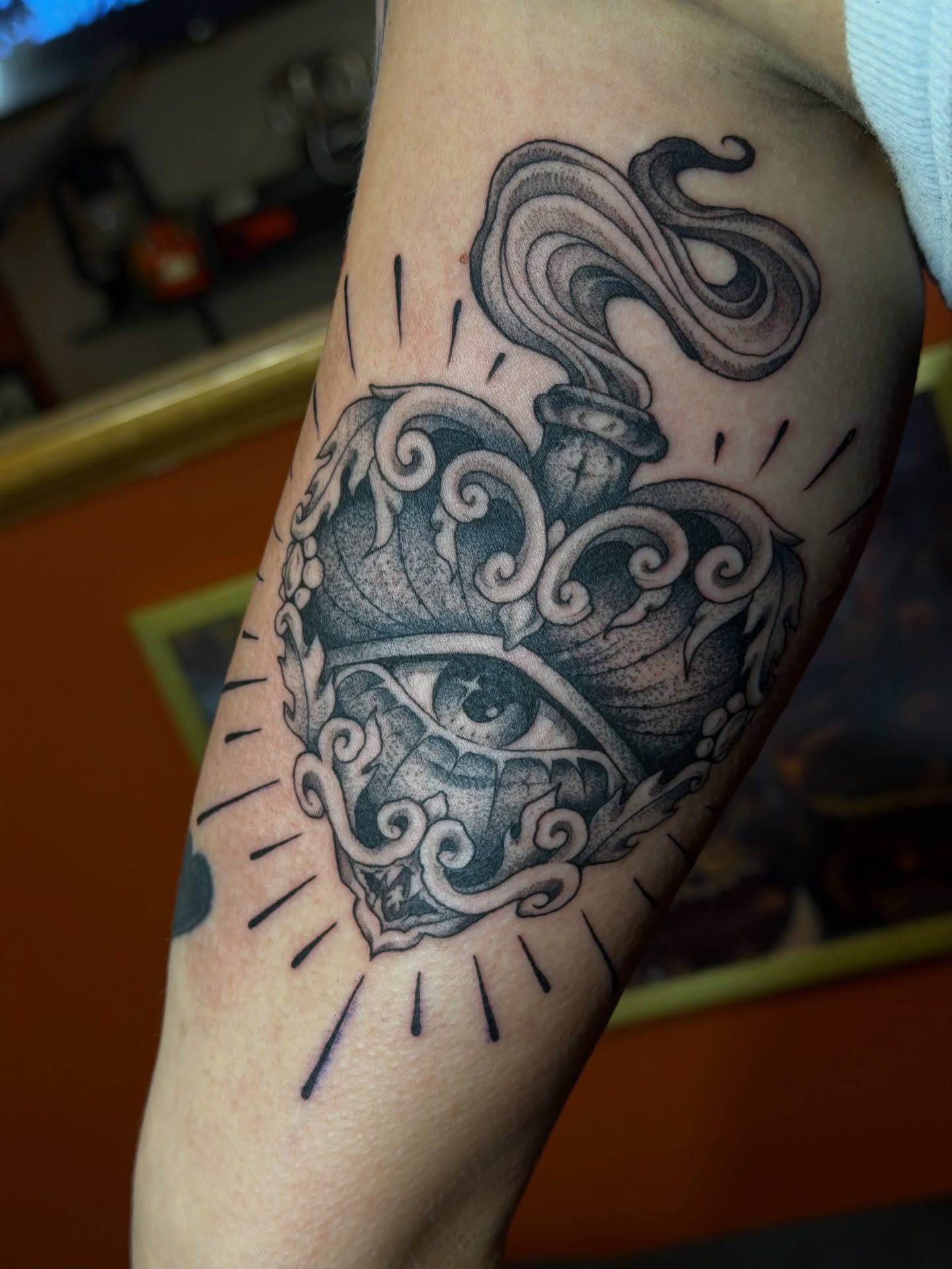 Eye and ornate swirls ornamental tattoo on the forearm by Gianna Calisi