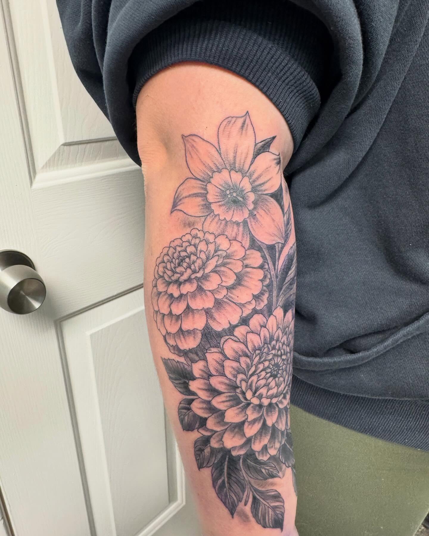 Flowers black and grey tattoo on the forearm by Brazun Locker Poloschan