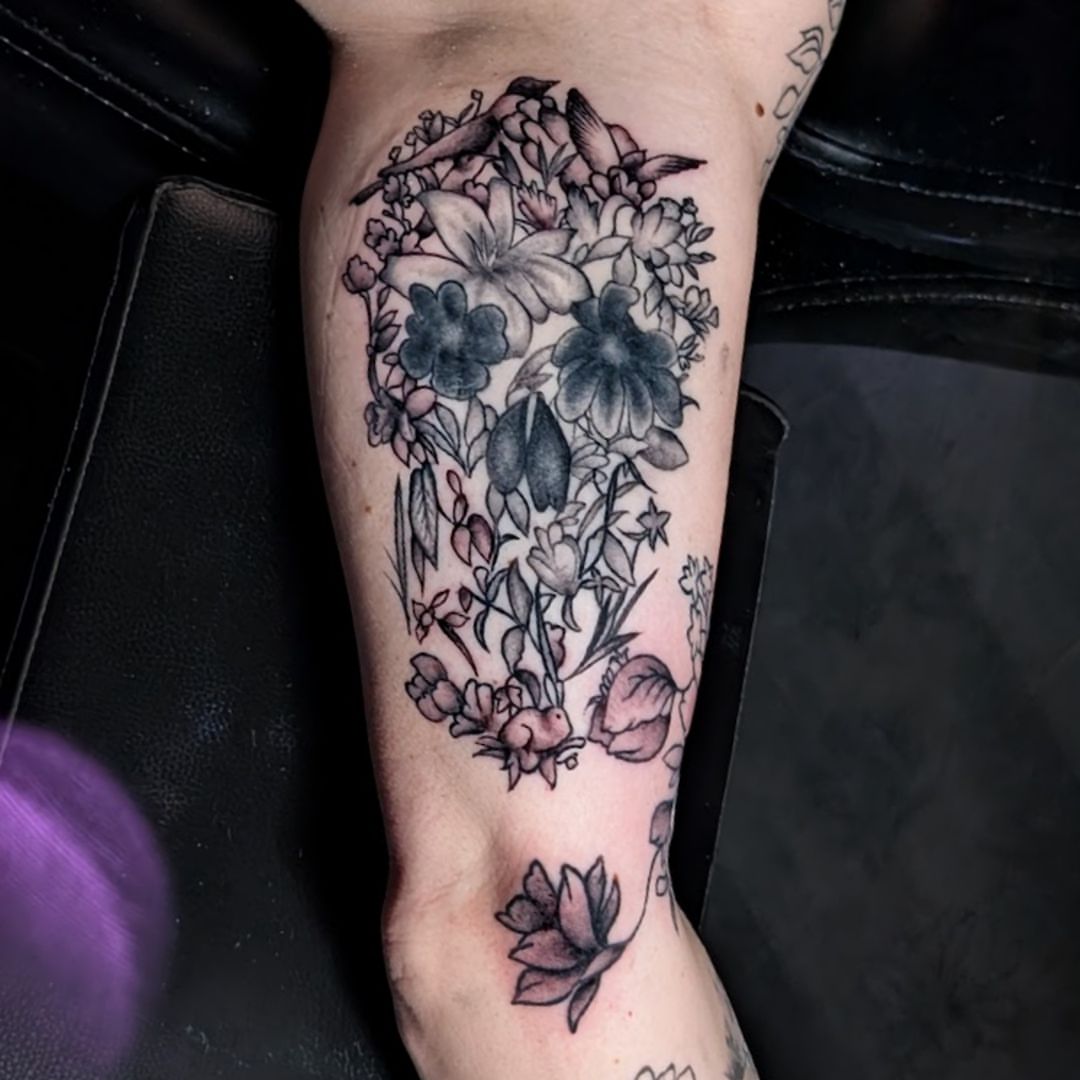 Floral bouquet dotwork tattoo on the forearm by Dave Chercourt, Willoughby, Ohio