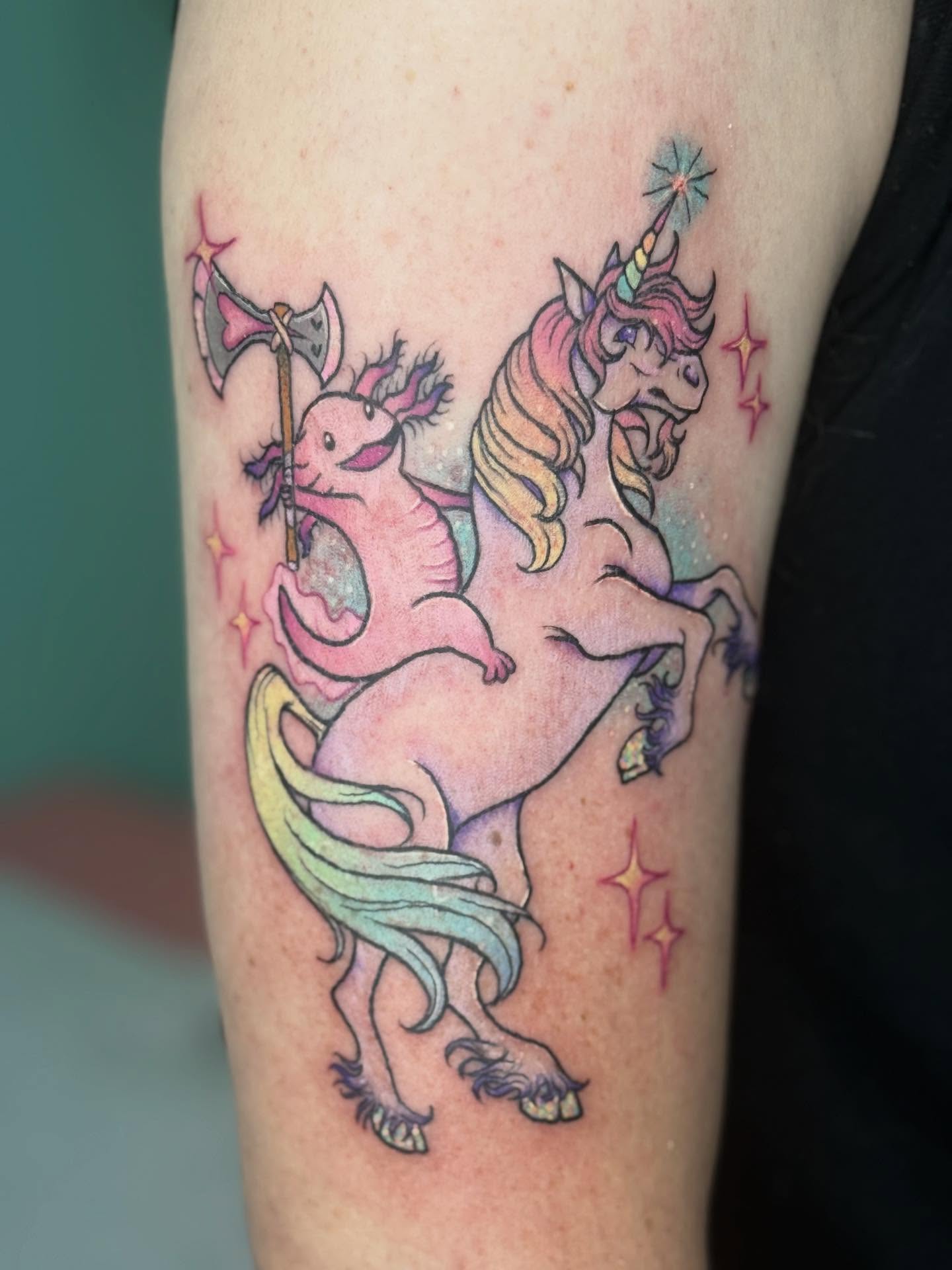 Unicorn and pig new school tattoo on the forearm by Bry