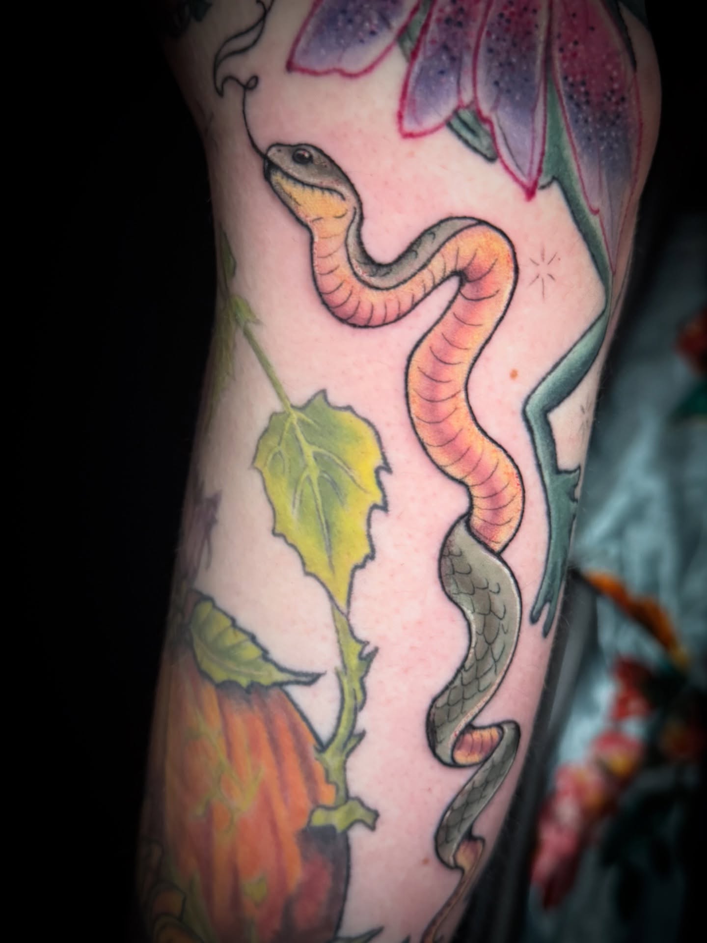 Snake and flowers American traditional tattoo on the forearm by M A D I E I N S P A N I E R π¦ tattoos