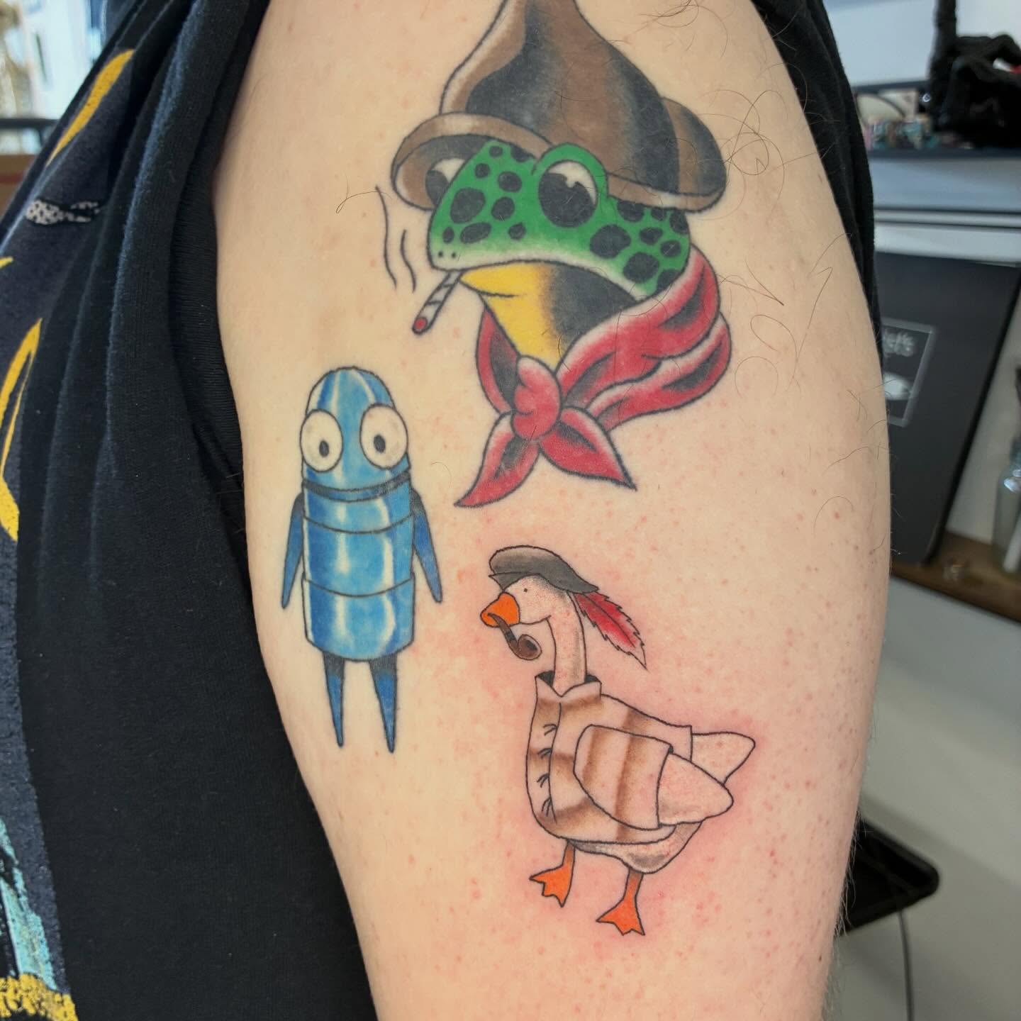 Frog, robot, duck American traditional tattoo on the forearm by Hit & Run Tattoo, Dayton, Ohio