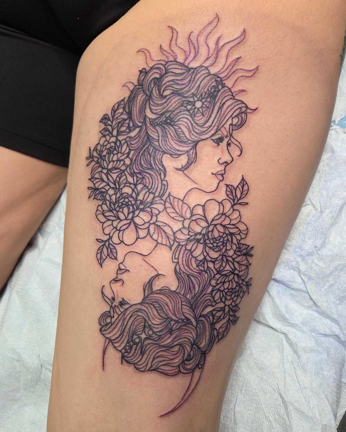 Floral woman illustrative tattoo on the thigh by Trinity Renee