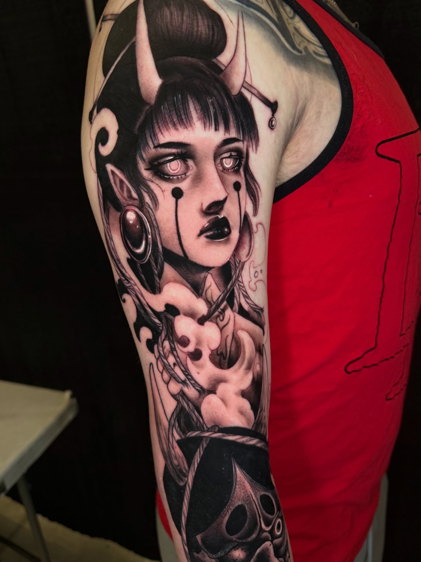 Woman with horns dark realism tattoo on the forearm by S C A B B e R W O C K y