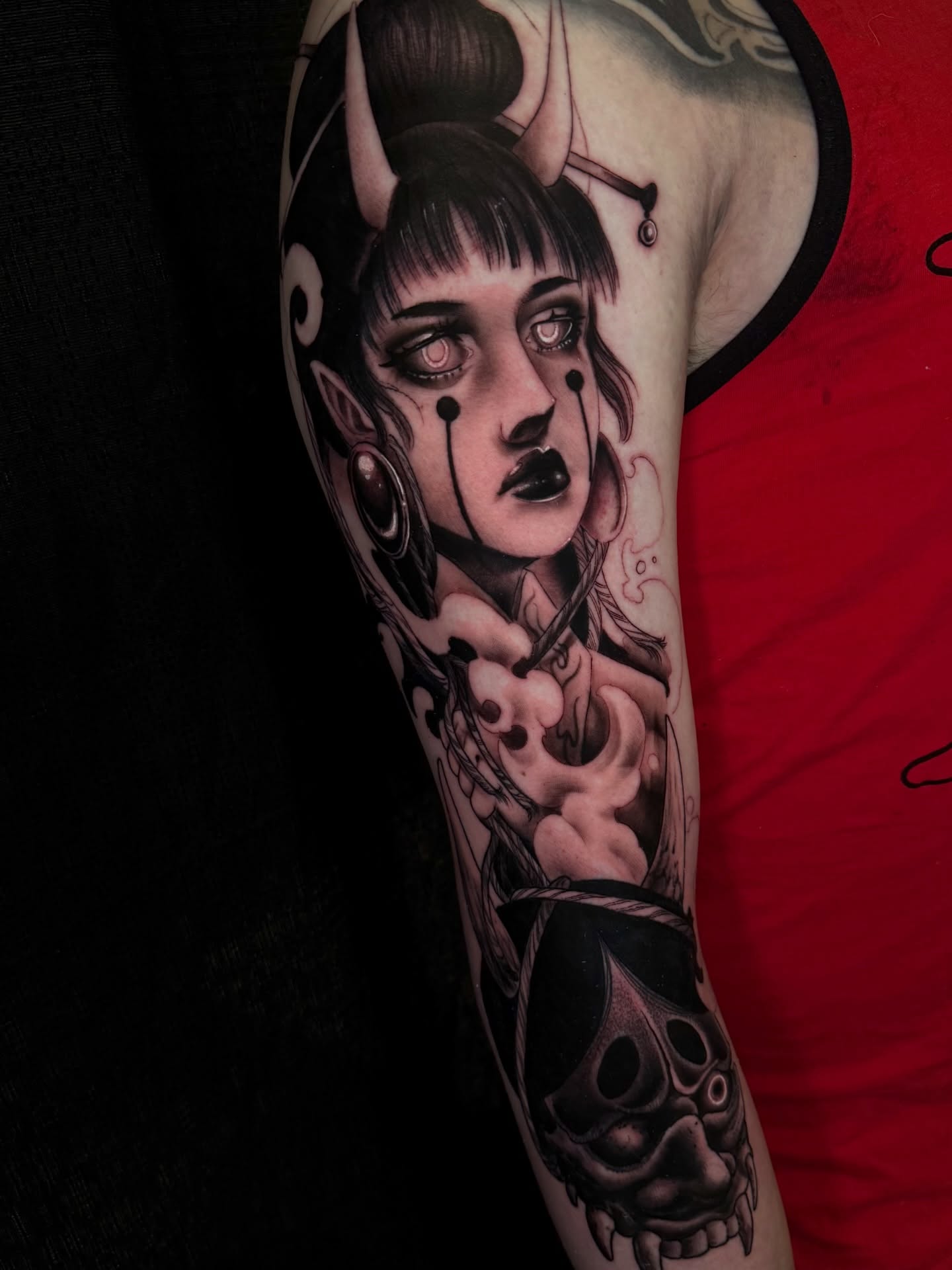 Woman with horns dark realism tattoo on the forearm by S C A B B e R W O C K y