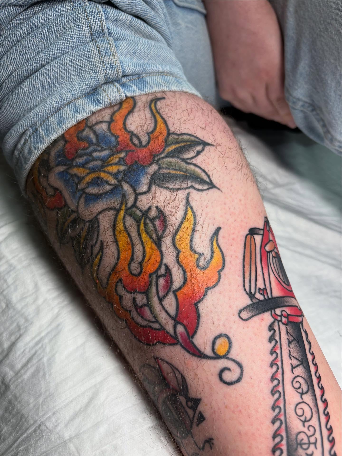 Flaming rose American traditional tattoo on the forearm by gia❤️‍🔥🎲, Maryville, Tennessee