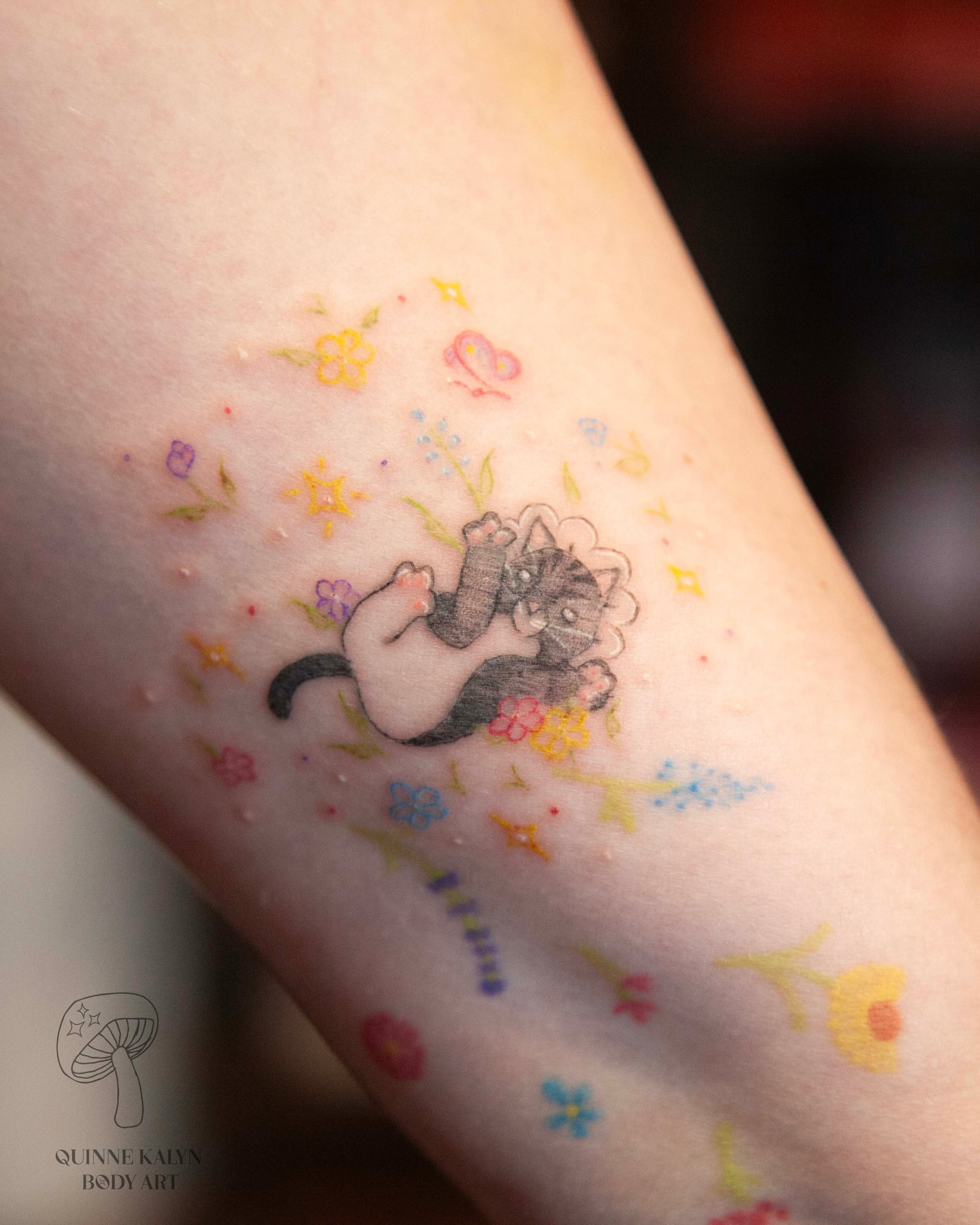 Cat and flowers dotwork tattoo on the forearm by Nashville Piercer & Tattoo Artist ✨ Quinne
