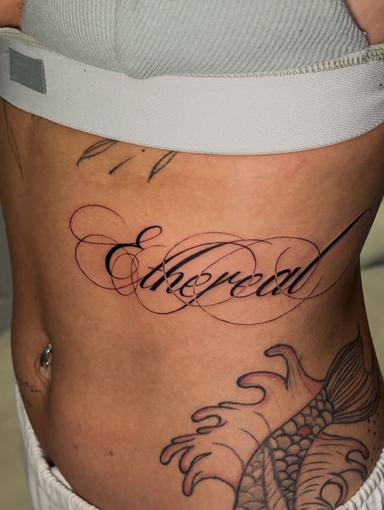 Tattoo by @eyekonic_ink — lettering_script