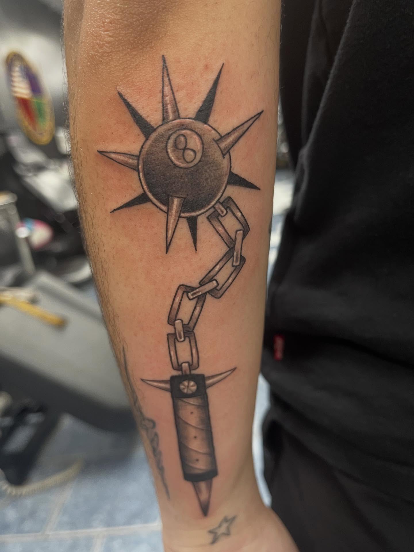Billiard ball and chain black and grey tattoo on the forearm by @artinjections667