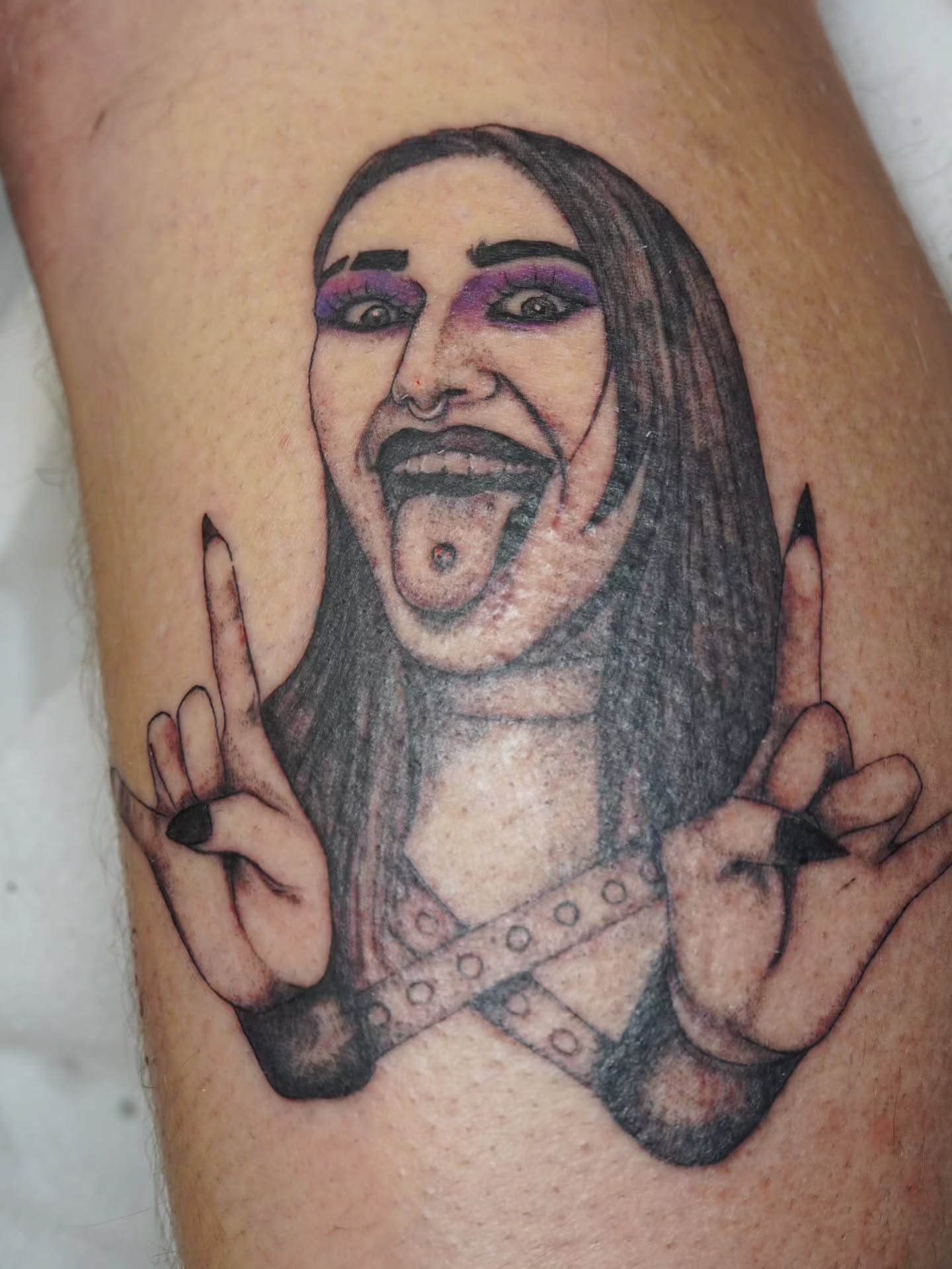 Portrait of a person realism tattoo on the thigh by Rachel, Centereach, New York