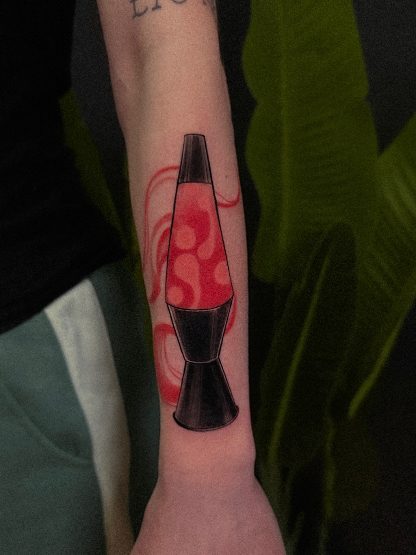 Lava lamp new school tattoo on the forearm by Tattoo Artist 👩🏻‍🎨 ATX