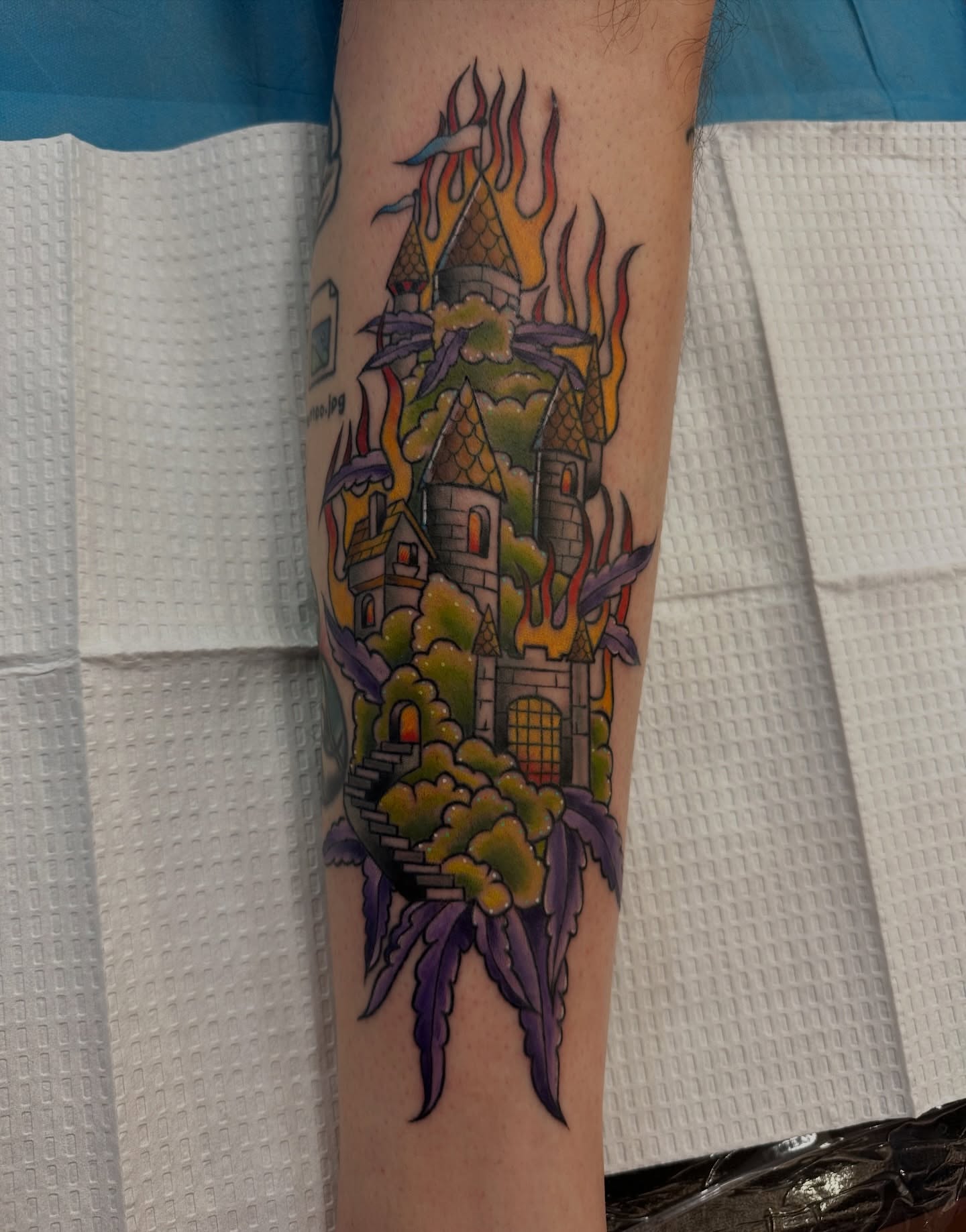 Castle new school tattoo on the forearm by Sam AlpineInk